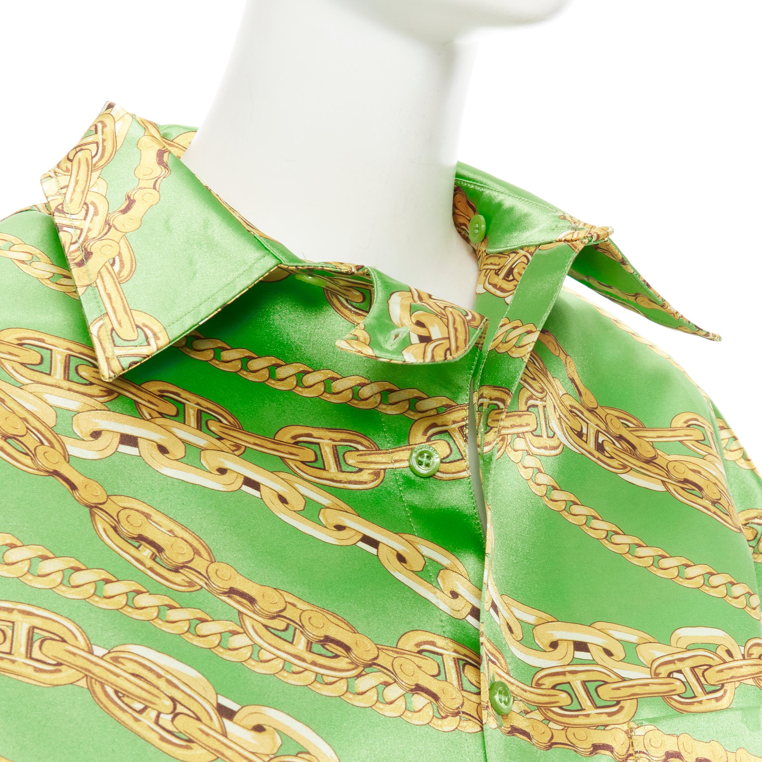 new BALENCIAGA 2018 Runway lime green gold chain stiffen boxy shirt FR34 XS 
Reference: TGAS/B01553 
Brand: Balenciaga 
Designer: Demna Gvasalia 
Collection: 2018 Runway 
Material: Polyester 
Color: Green 
Closure: Button 
Extra Detail: Stiffened