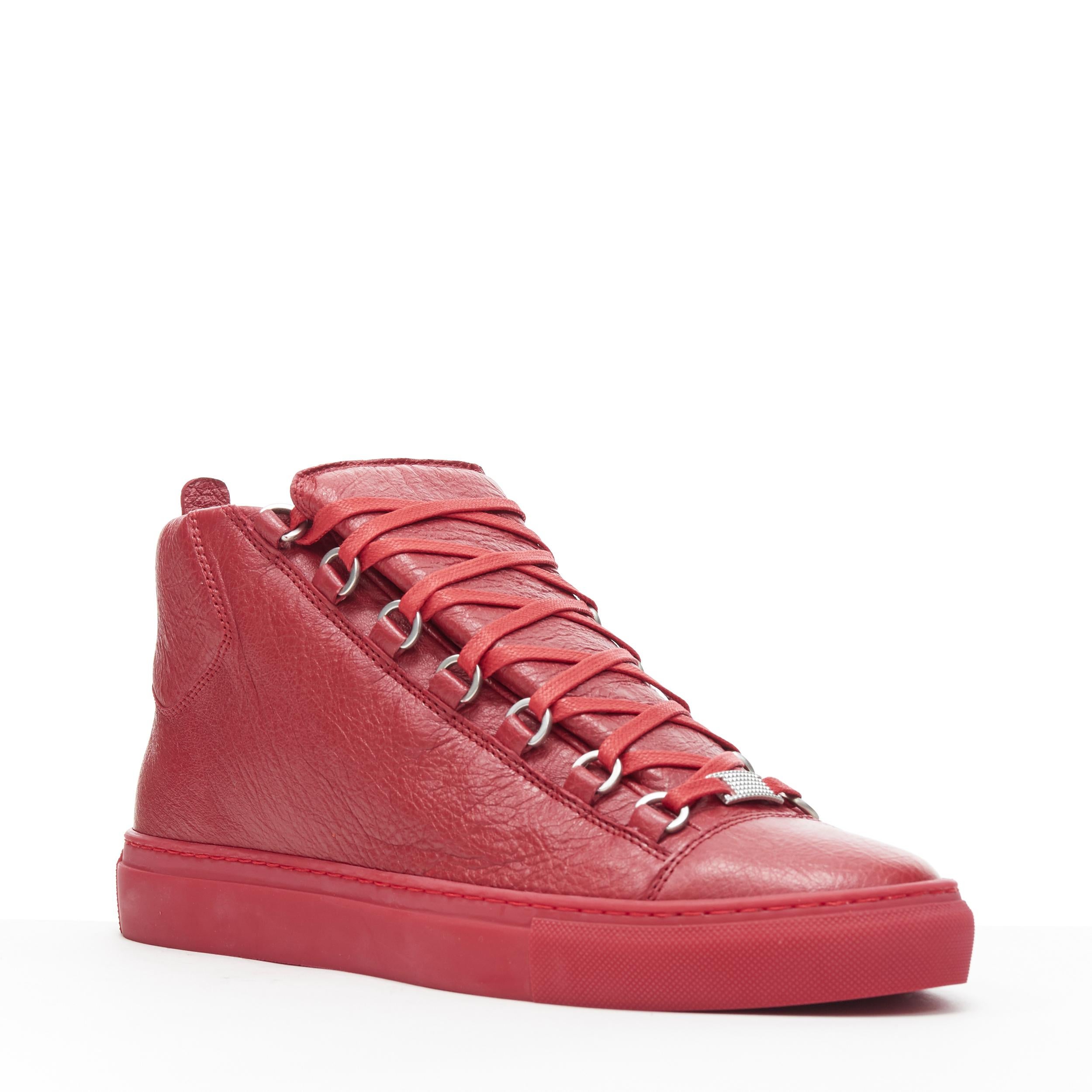 new BALENCIAGA Arena All Red high top sneakers EU40 US7 483497 WAY40 6212
Brand: Balenciaga
Model Name / Style: Balenciaga Arena
Material: Leather
Color: Red
Pattern: Solid
Closure: Lace up
Extra Detail: A classic luxury sneaker style from
