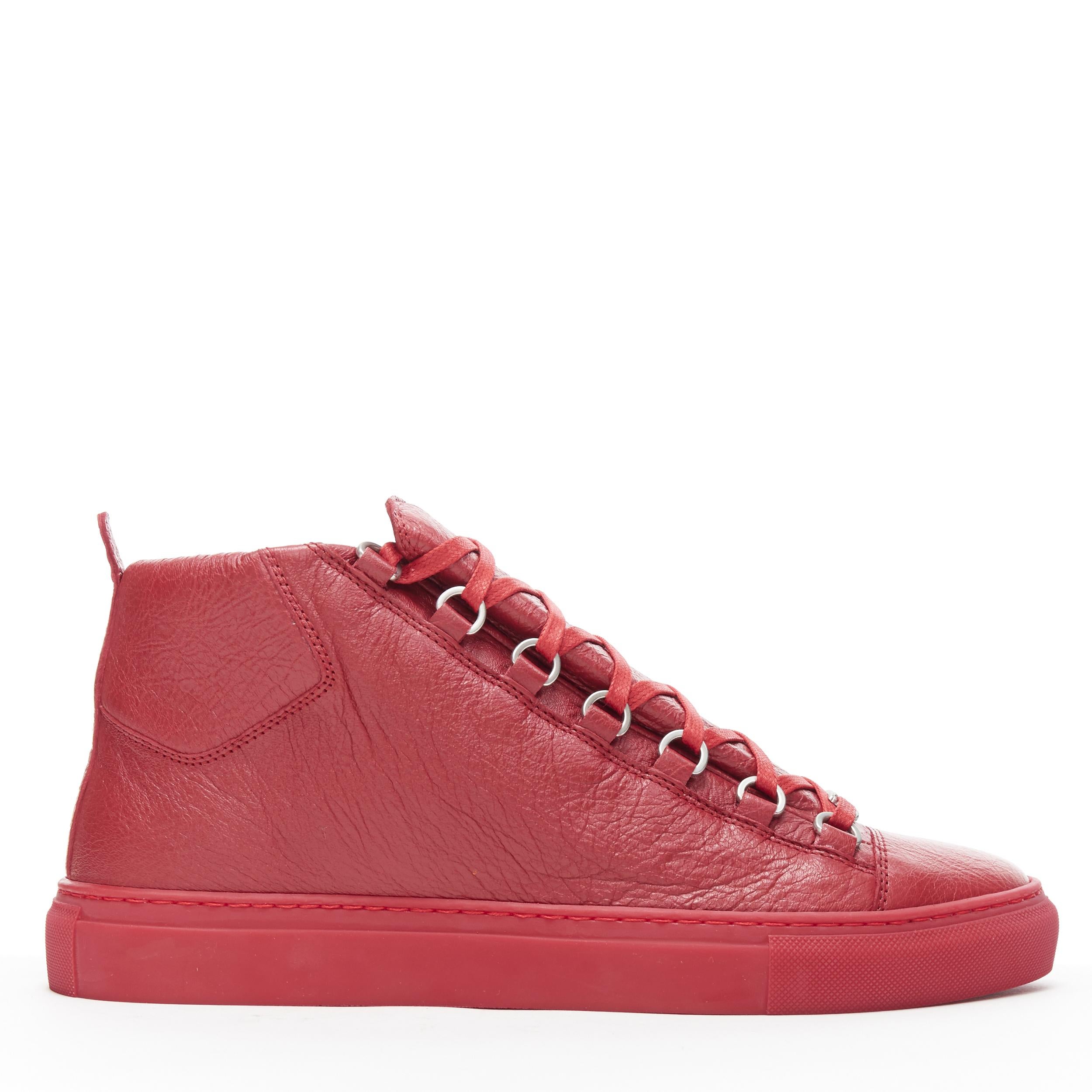 new BALENCIAGA Arena All Red high top sneakers EU41 US8 483497 WAY40 6212
Brand: Balenciaga
Model Name / Style: Balenciaga Arena
Material: Leather
Color: Red
Pattern: Solid
Closure: Lace up
Extra Detail: A classic luxury sneaker style from