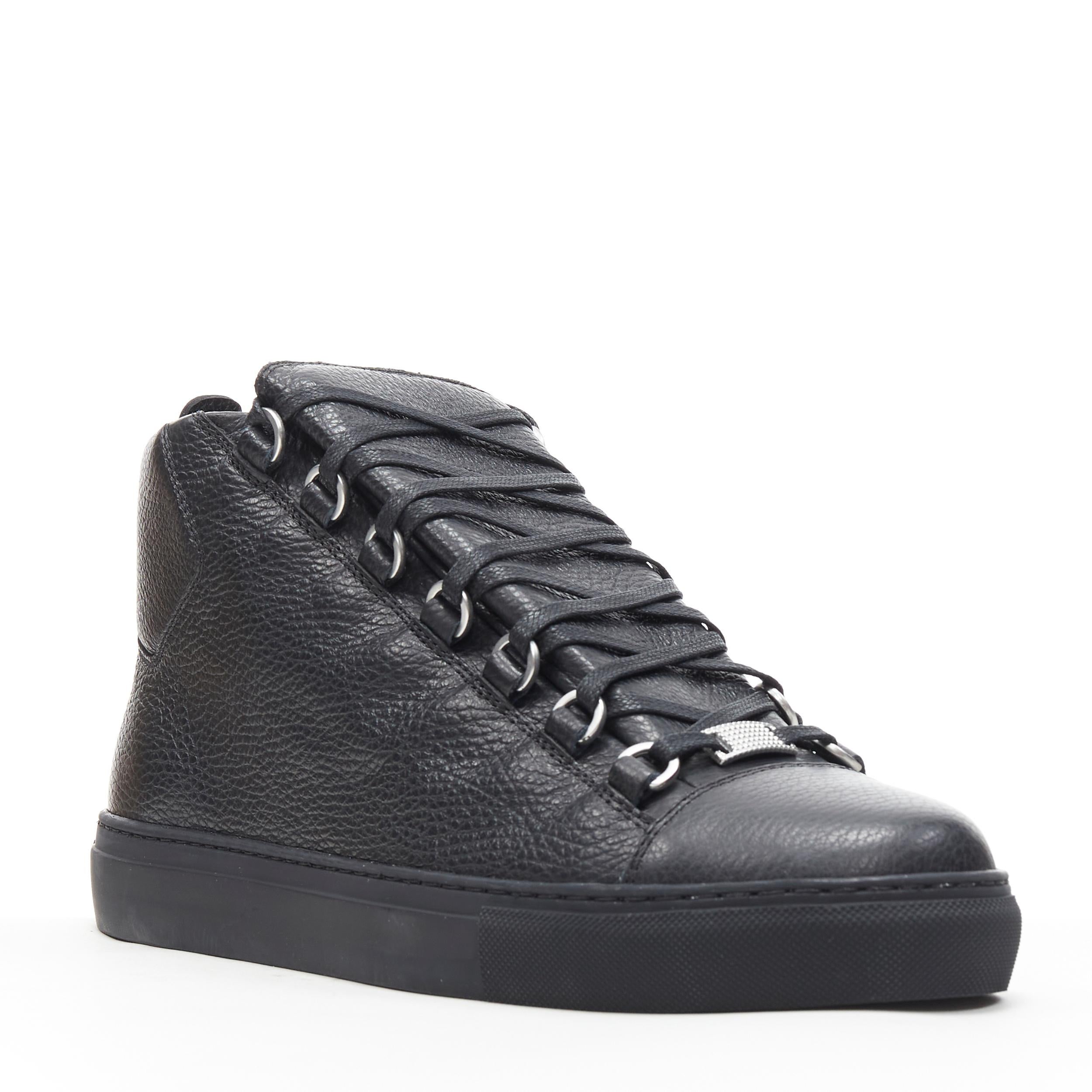 new BALENCIAGA Arena Black Calf high top sneakers EU44 US10 565560 WA2N0 1000 
Reference: TGAS/B00165 
Brand: Balenciaga 
Designer: Demna Gvasalia 
Model: Arena 
Material: Leather 
Color: Black 
Pattern: Solid 
Closure: Lace Up 
Made in: Italy