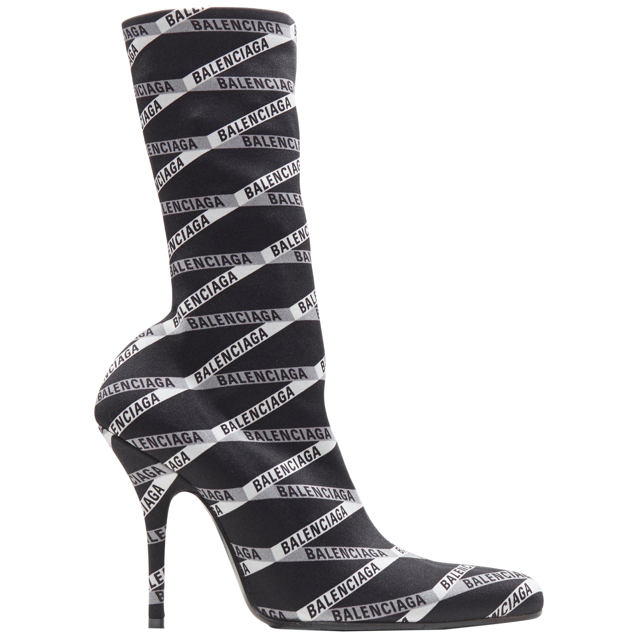new BALENCIAGA black all-over logo print spandex high heel sock ankle boot  EU39 at 1stDibs | balenciaga heel boots, balenciaga sock boots, balenciaga  sock high heels