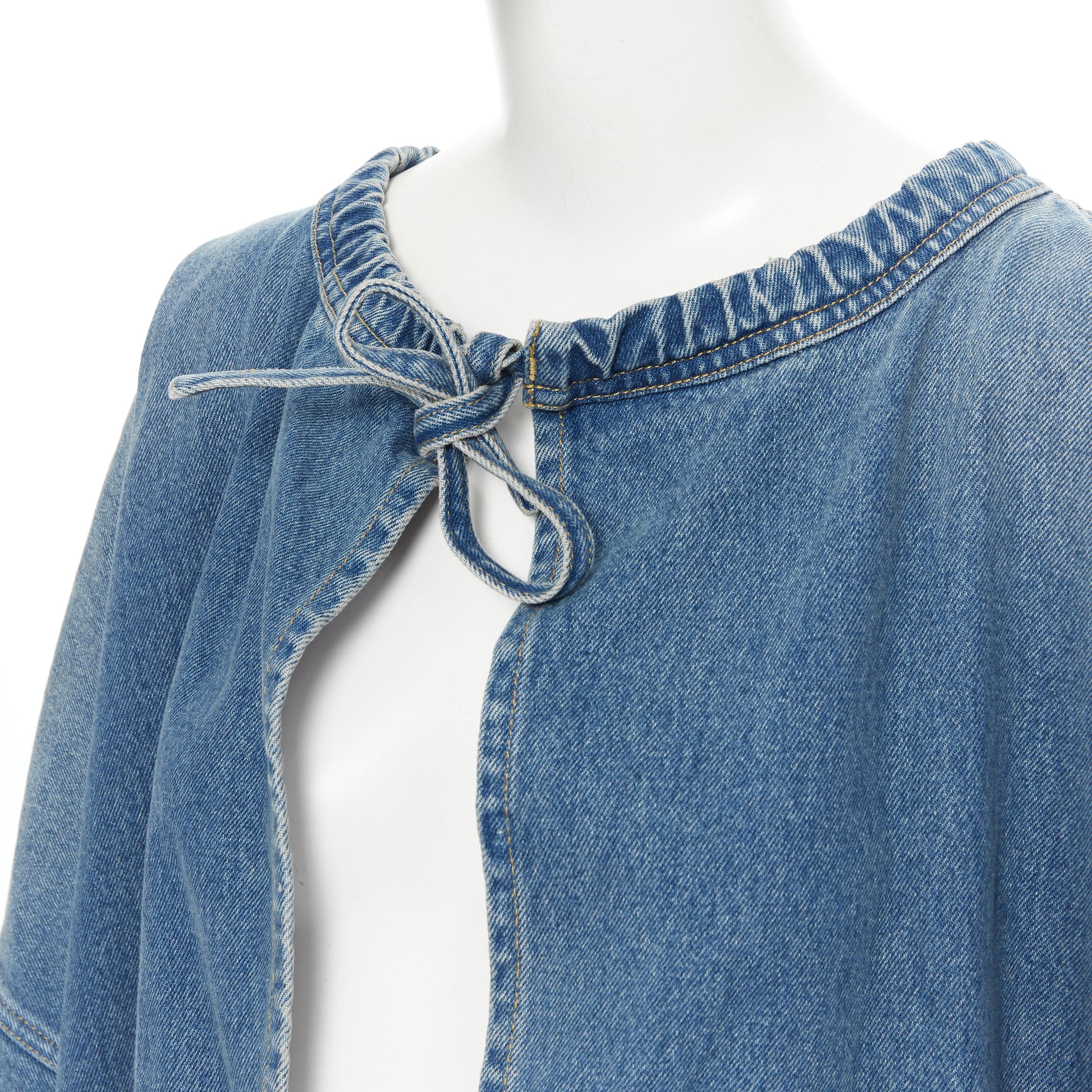 new BALENCIAGA DEMNA 2017 Runway blue denim kimono sleeve wrap coat FR36 XS 
Reference: TGAS/B00163 
Brand: Balenciaga 
Designer: Demna Gvasalia 
Collection: 2017 Runway 
Material: Denim 
Color: Blue 
Pattern: Solid 
Closure: Tie 
Made in: Italy
