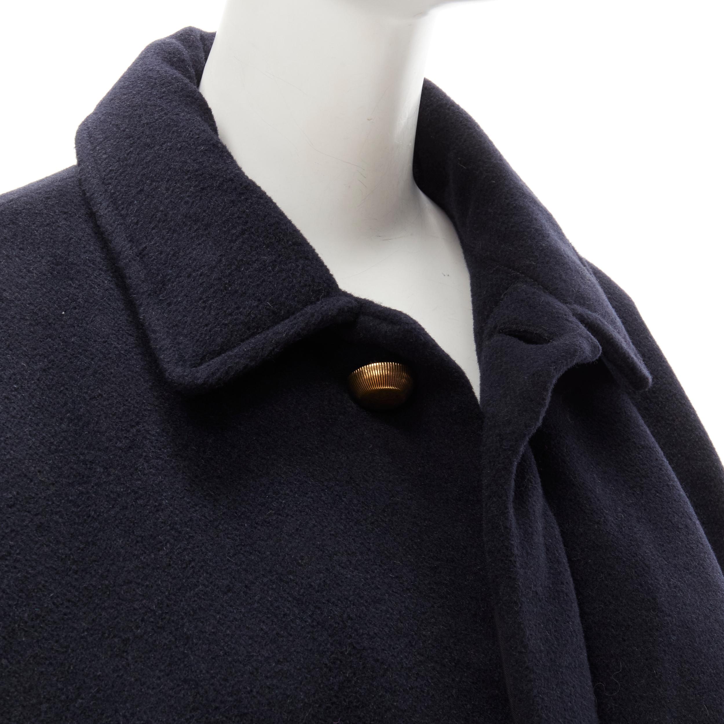 new BALENCIAGA DEMNA 2019 navy camel antique gold button cocoon coat FR38 M
Brand: Balenciaga
Designer: Demna
Collection: 2019 
Material: Camel
Color: Navy
Pattern: Solid
Closure: Button
Extra Detail: Extremely oversized cocoon coat. Navy camel wool
