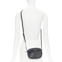 new BALENCIAGA Demna Everyday Camera XS black leather logo print crossbody bag