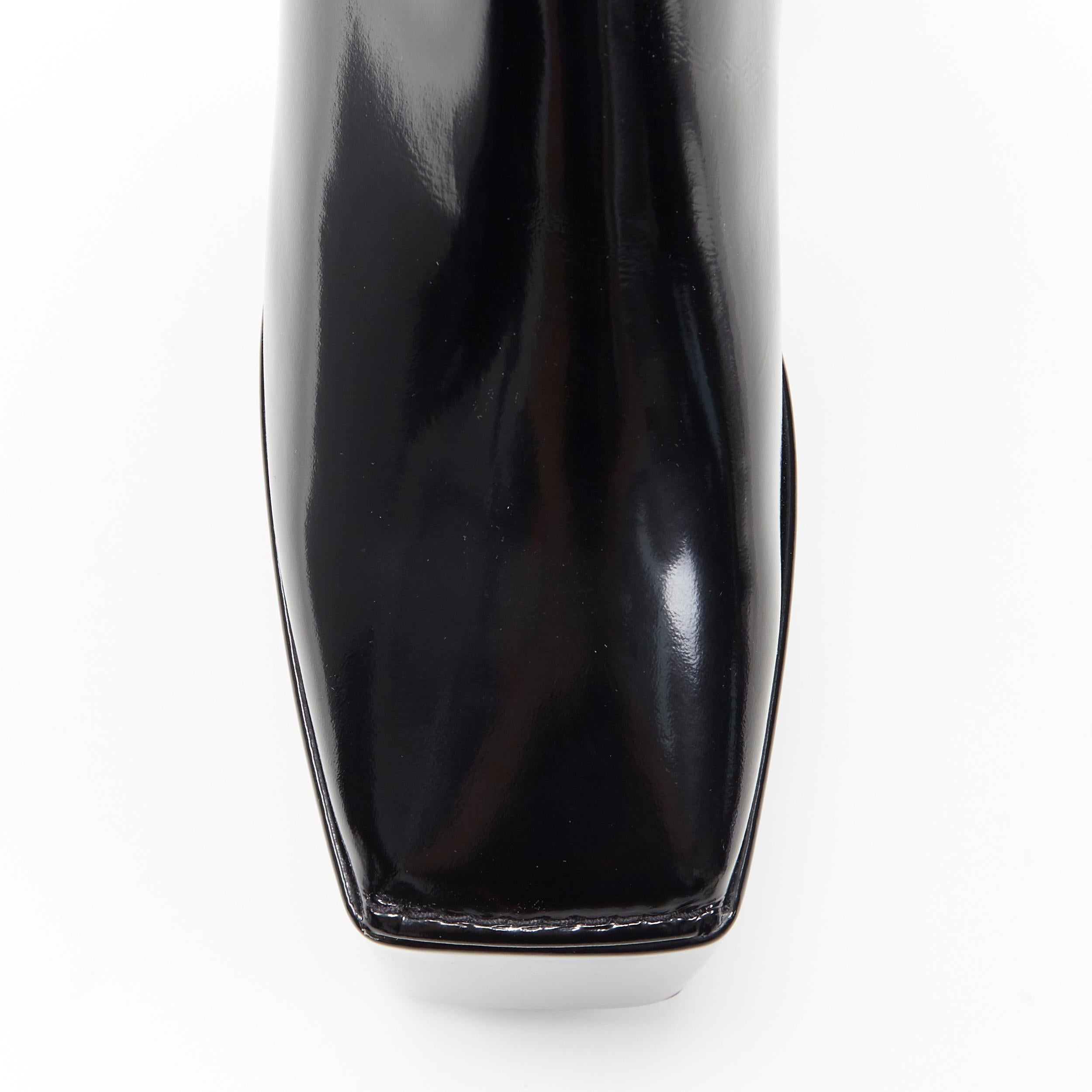 new BALENCIAGA DEMNA iconic Wayio black polished leather platform boots EU39
Brand: Balenciaga
Designer: Demna Gvasalia
Model Name / Style: Wayio
Material: Leather
Color: Black
Pattern: Solid
Closure: Zip
Extra Detail: Square toe. Platform sole.