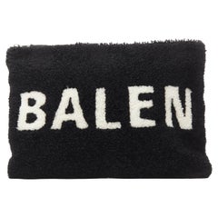 new BALENCIAGA Demna logo print black white dyed merino shearling zip clutch bag