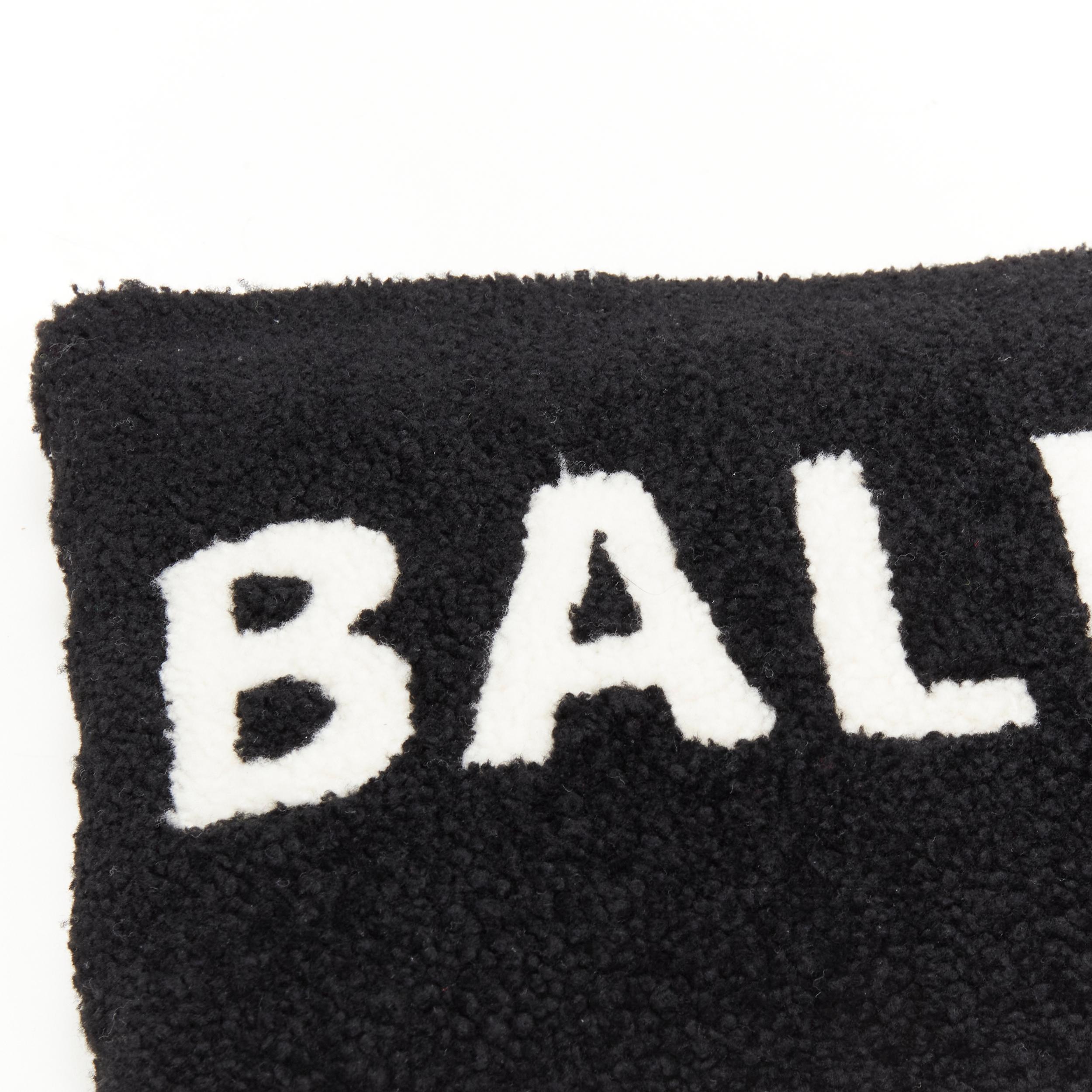 new BALENCIAGA Demna logo print black white merino lamb shearling zip clutch bag 1