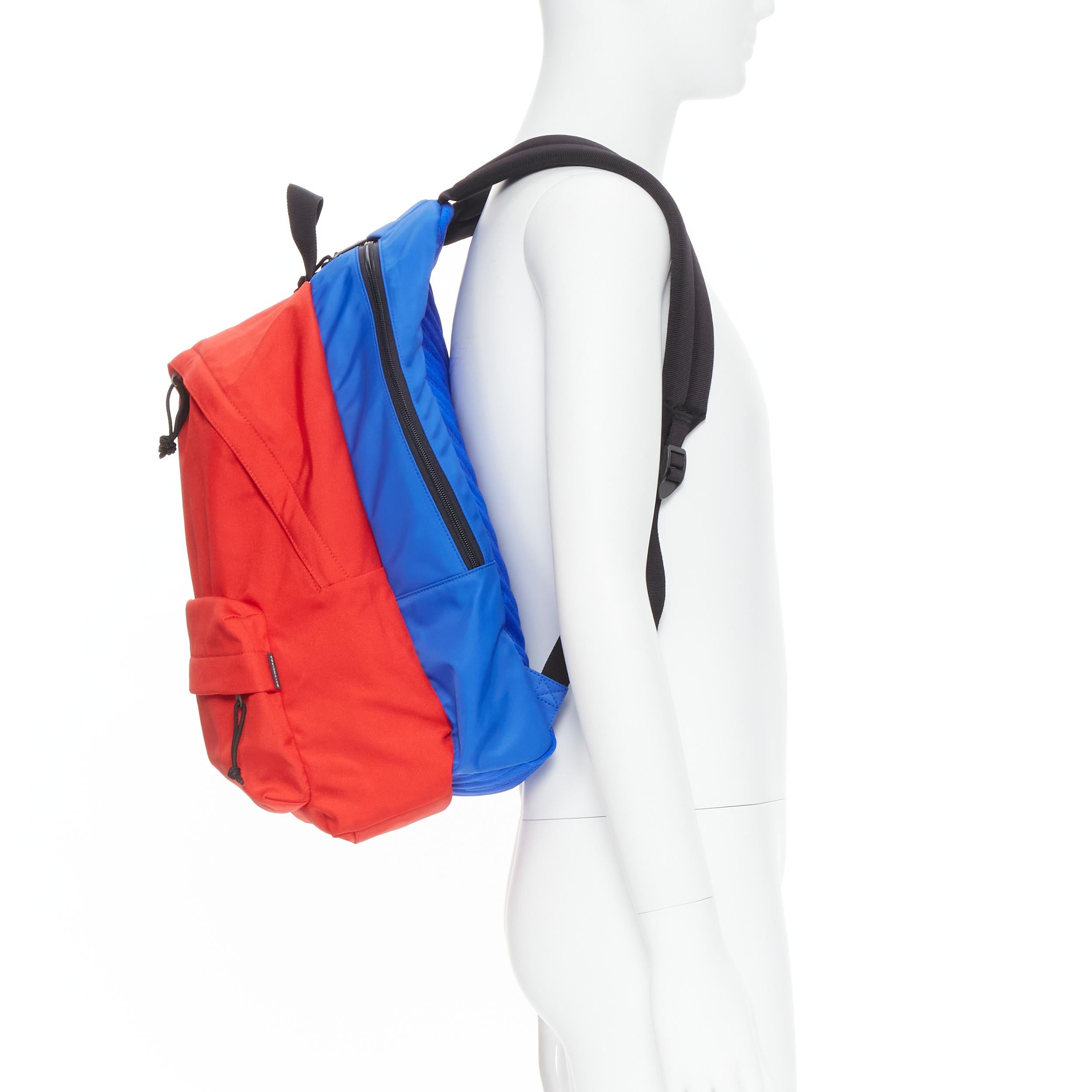 new BALENCIAGA Double Backpack red blue nylon layered monogram jacquard bag Reference: TGAS/B01522 Brand: Balenciaga Designer: Demna Gvasalia Model: Double backpack Material: Nylon Color: Red Pattern: Solid Closure: Zip Extra Detail: Double