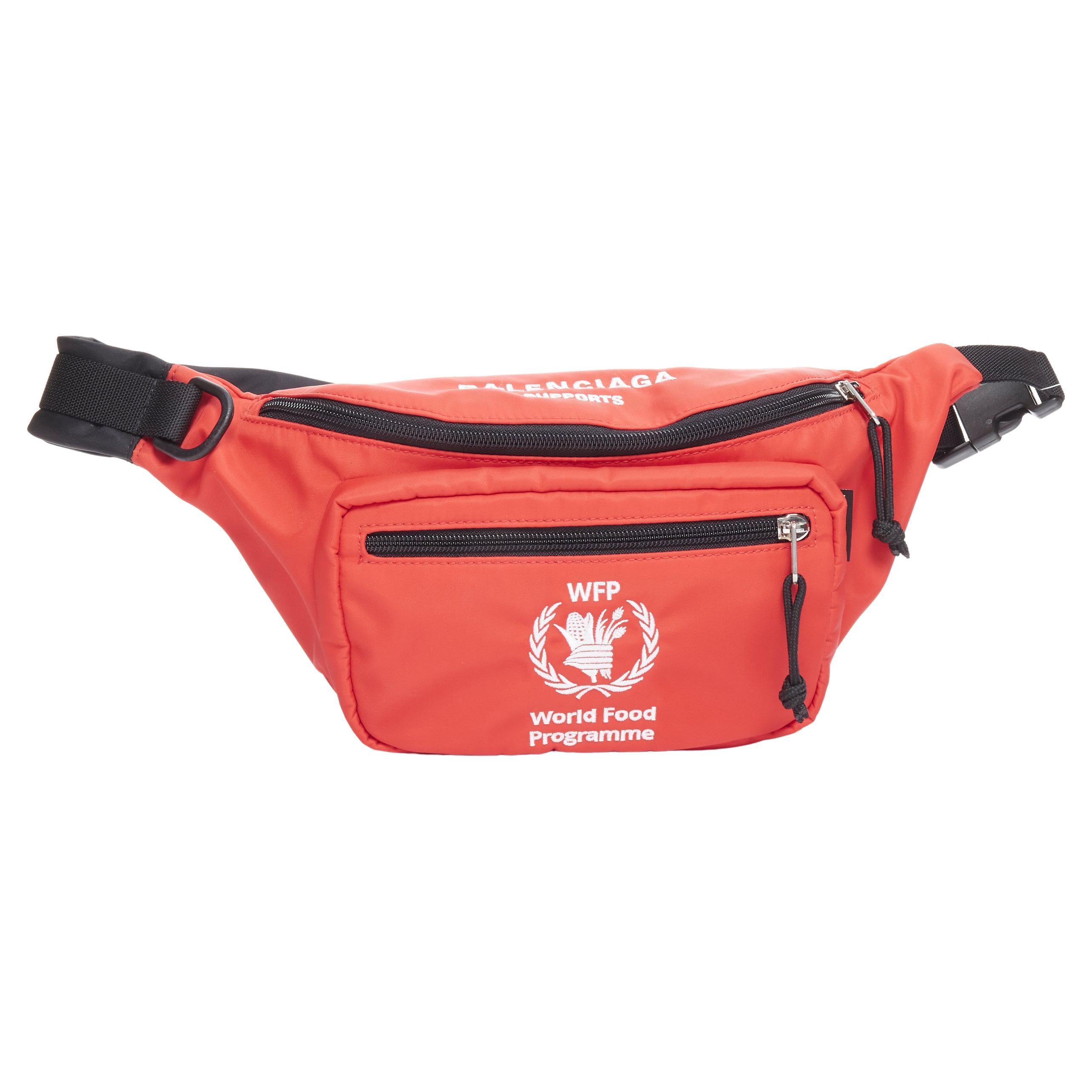 new BALENCIAGA Explorer WFP World Food Program red nylon crossbody belt bag  at 1stDibs