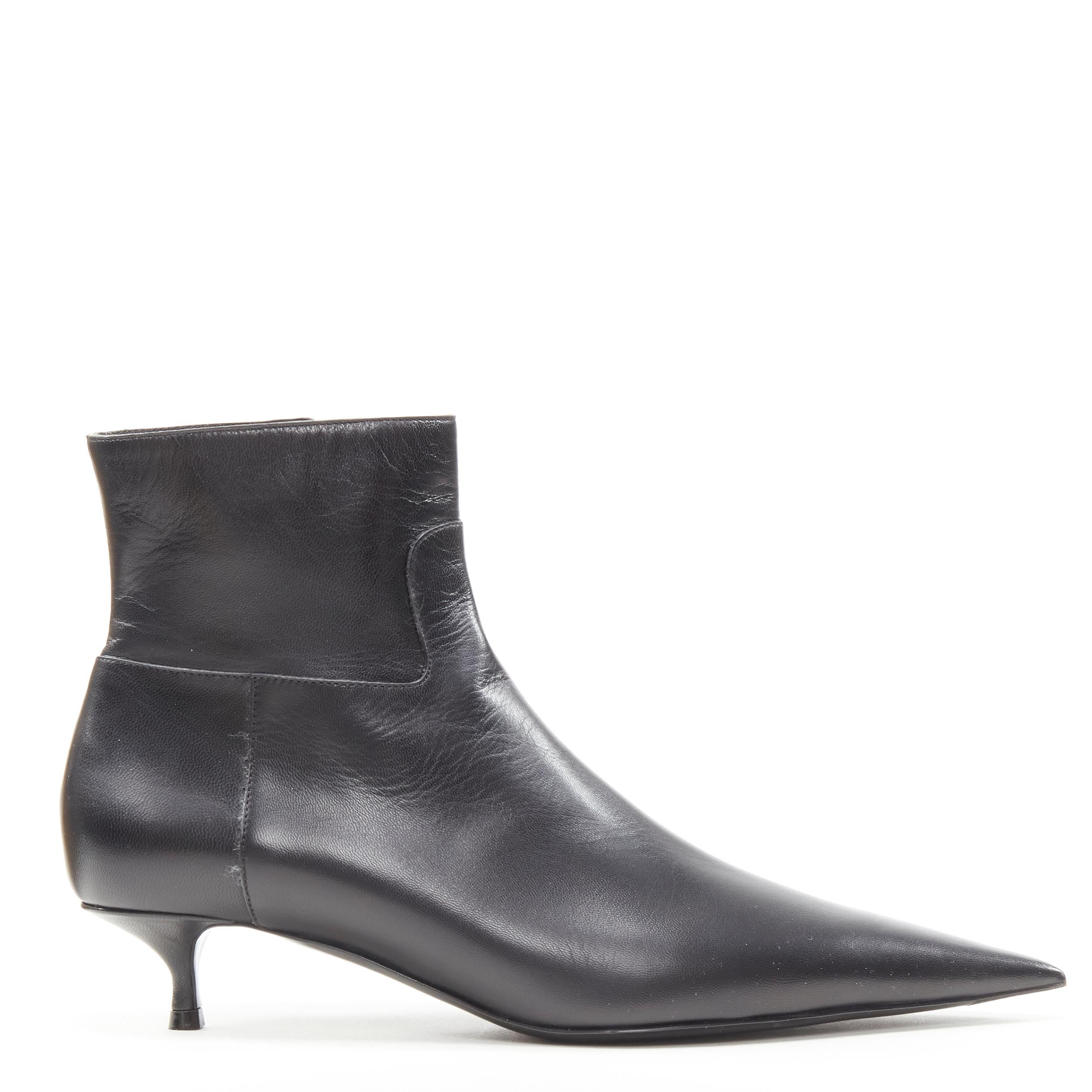 new BALENCIAGA Knife black calfskin leather kitten heel bootie EU37.5 US7.5 
Reference: TGAS/B02245 
Brand: Balenciaga 
Designer: Demna 
Color: Black 
Pattern: Solid 
Closure: Zip 
Extra Detail: Extra pointy Knife silhouette. Kitten heel. 
Made in:
