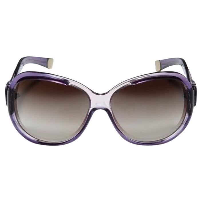 Occhiali da sole Balenciaga
Nuovo di zecca
* Lenti leggermente a specchio
* Cornici viola chiaro e scuro
* Larghezza del telaio: 6,5