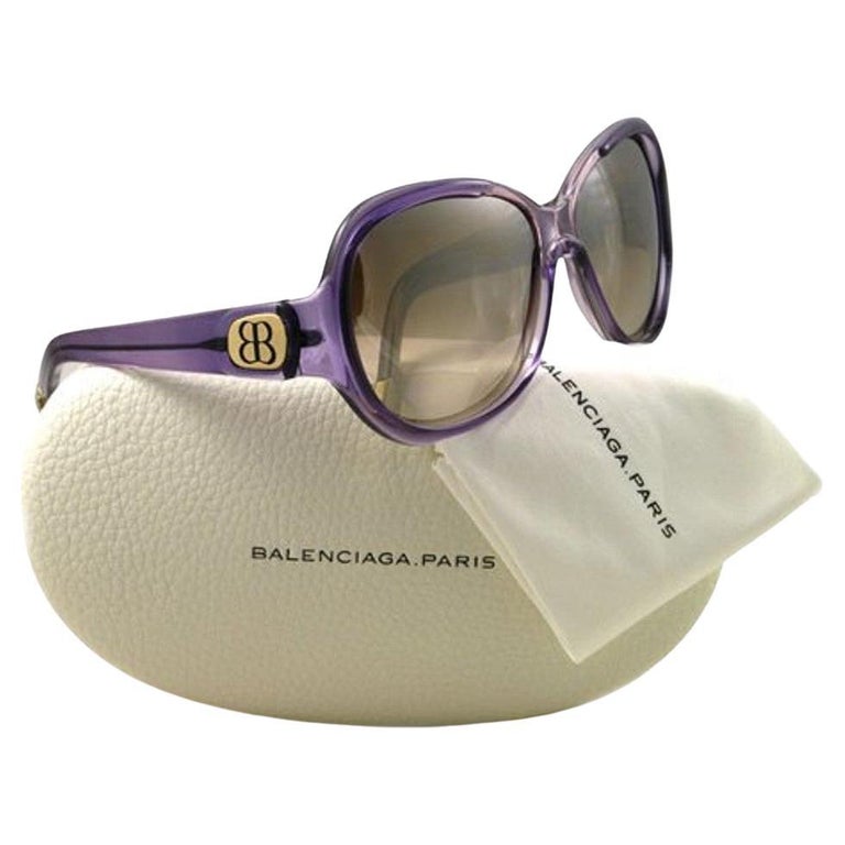 Balenciaga - Lunettes de soleil réfléchissantes violettes, avec étui, état  neuf En vente sur 1stDibs
