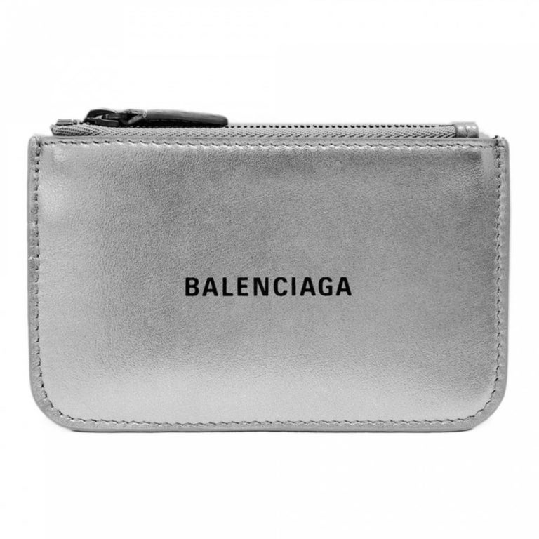 Balenciaga - Sac à main en cuir avec logo imprimé argenté et chaîne à clé,  état neuf En vente sur 1stDibs