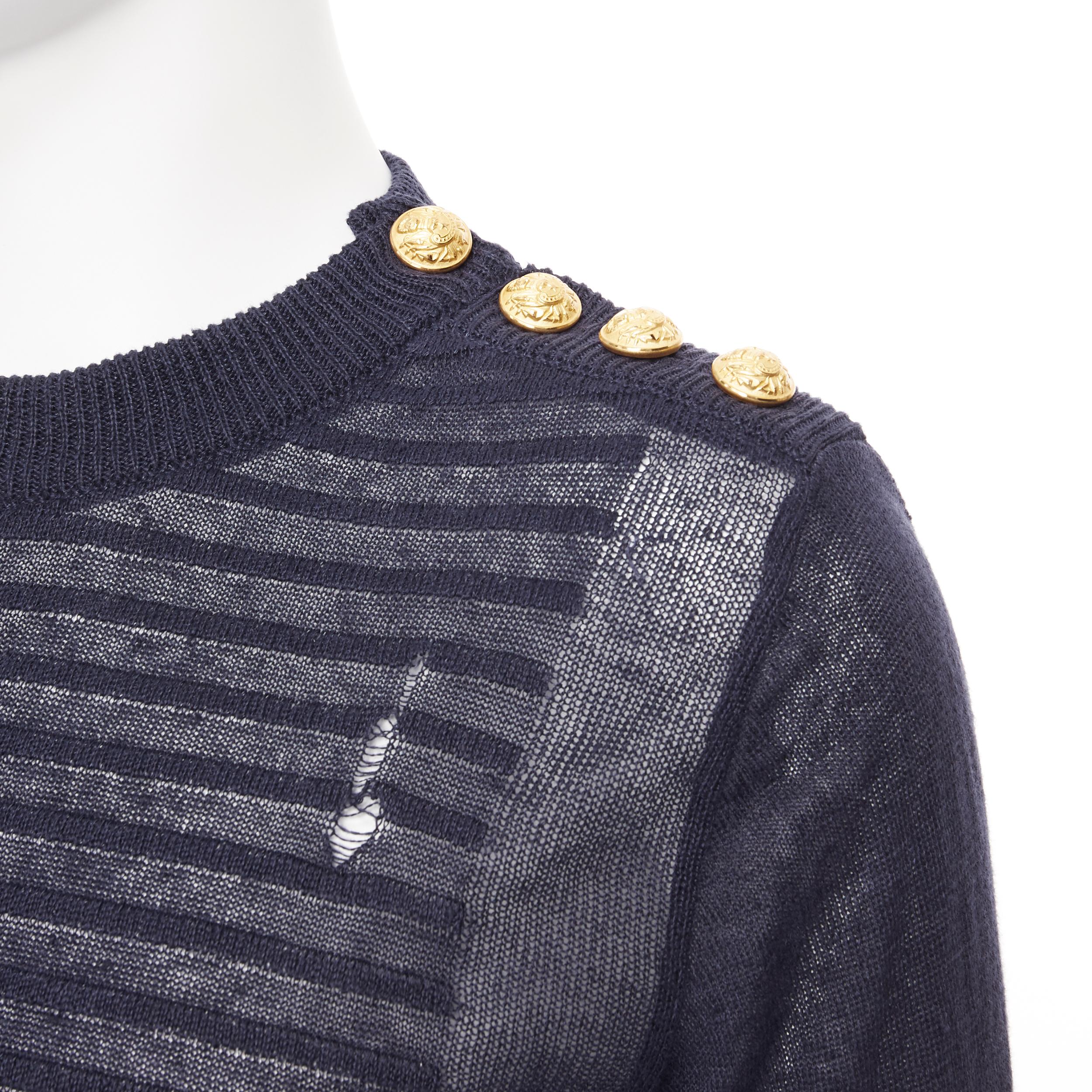 new BALMAIN 100% linen navy stripe gold military button distressed sweater XS
Brand: Balmain
Designer: Olivier Rousteing
Model Name / Style: Distressed sweater
Material: Linen
Color: Black
Pattern: Striped
Extra Detail: BALMAIN style code: