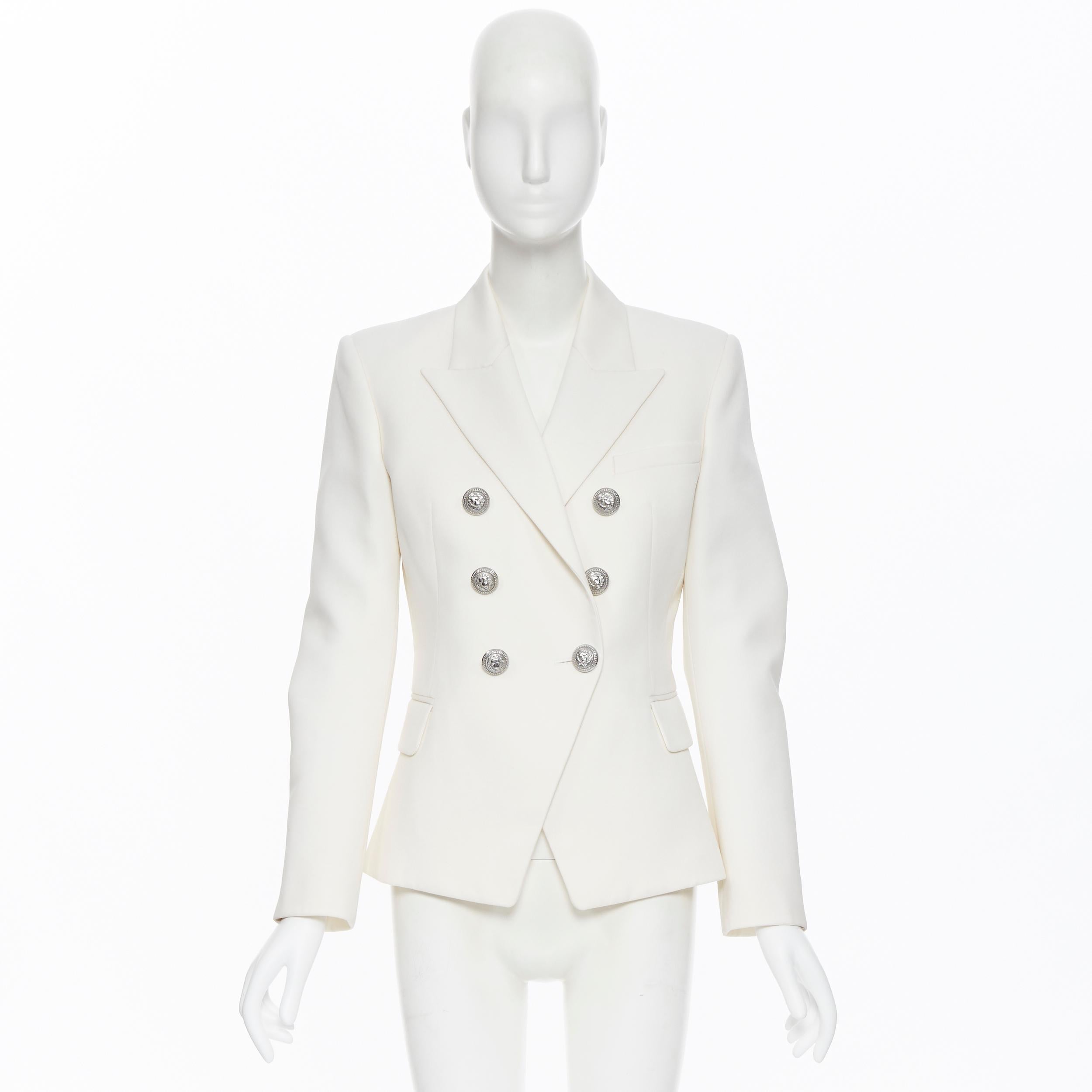 new BALMAIN 100% wool white silver button double breasted blazer jacket FR38 M
Brand: Balmain
Designer: Olivier Rousteing
Model Name / Style: Double breasted jacket
Material: Wool
Color: White
Pattern: Solid
Closure: Button
Extra Detail: A long-time