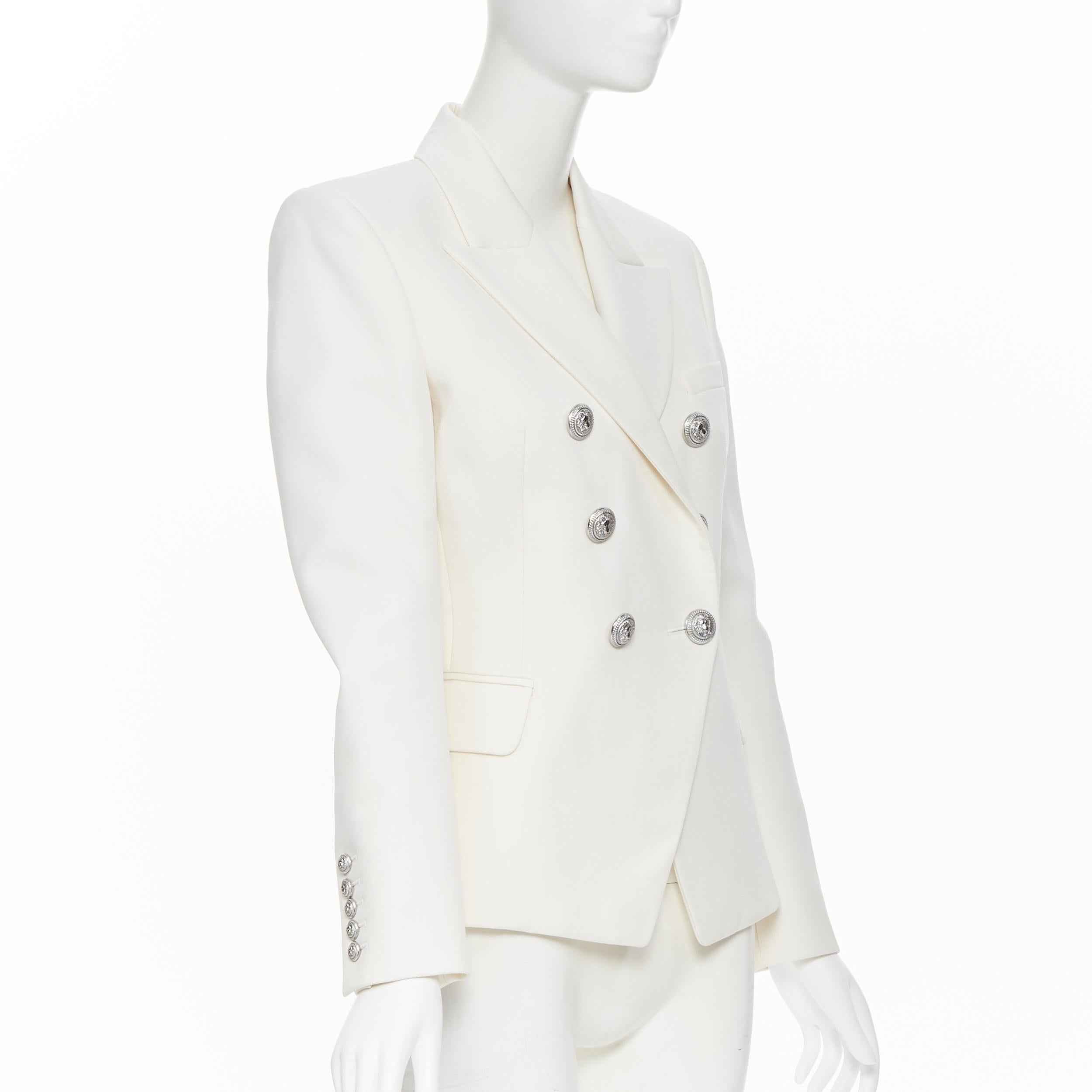 white blazer with silver buttons