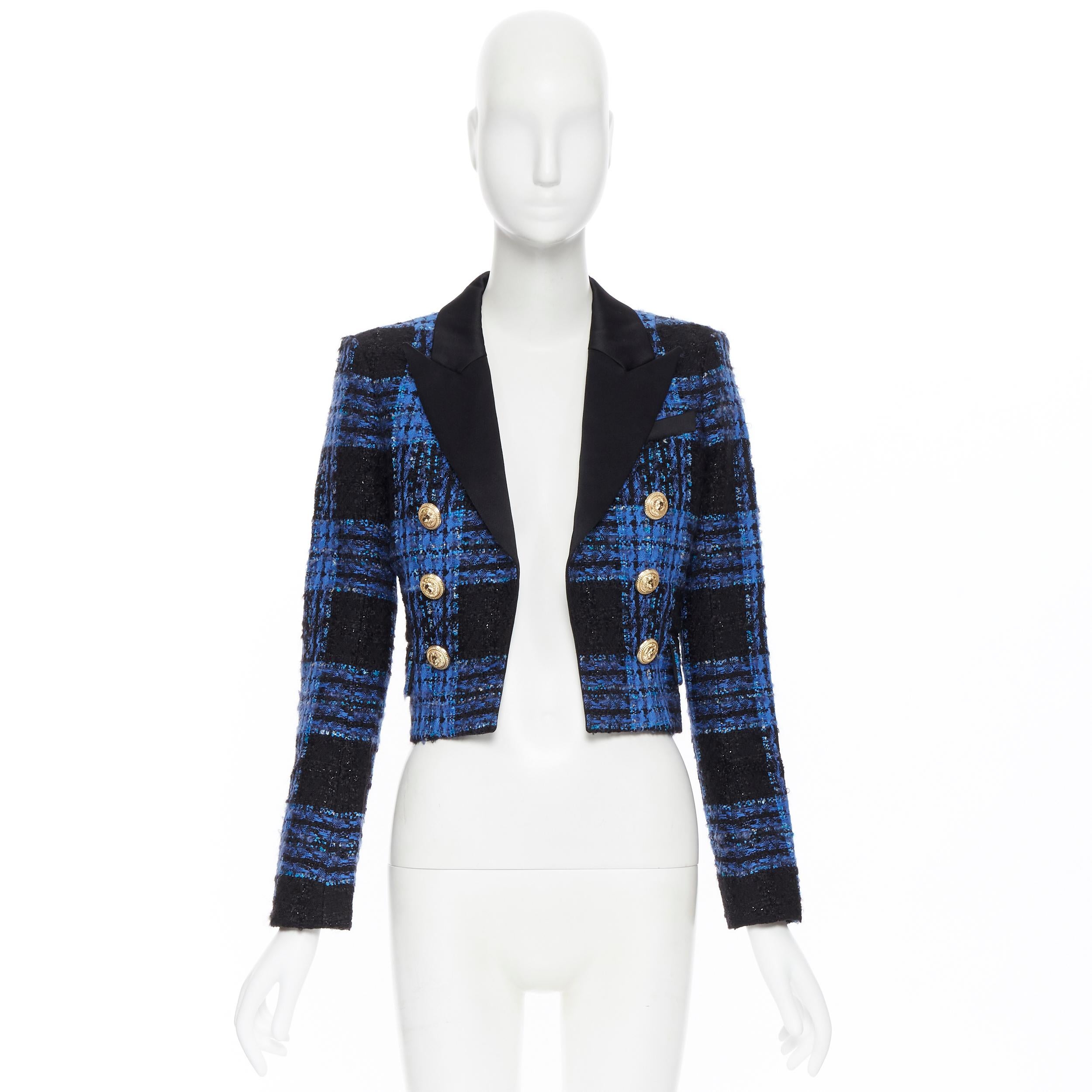 new BALMAIN blue black tweed gold button cropped double breasted jacket FR36 XS
Brand: Balmain
Designer: Olivier Rousteing
Model Name / Style: Double breasted jacket
Material: Tweed
Color: Blue
Pattern: Check
Closure: Button
Extra Detail: Black and