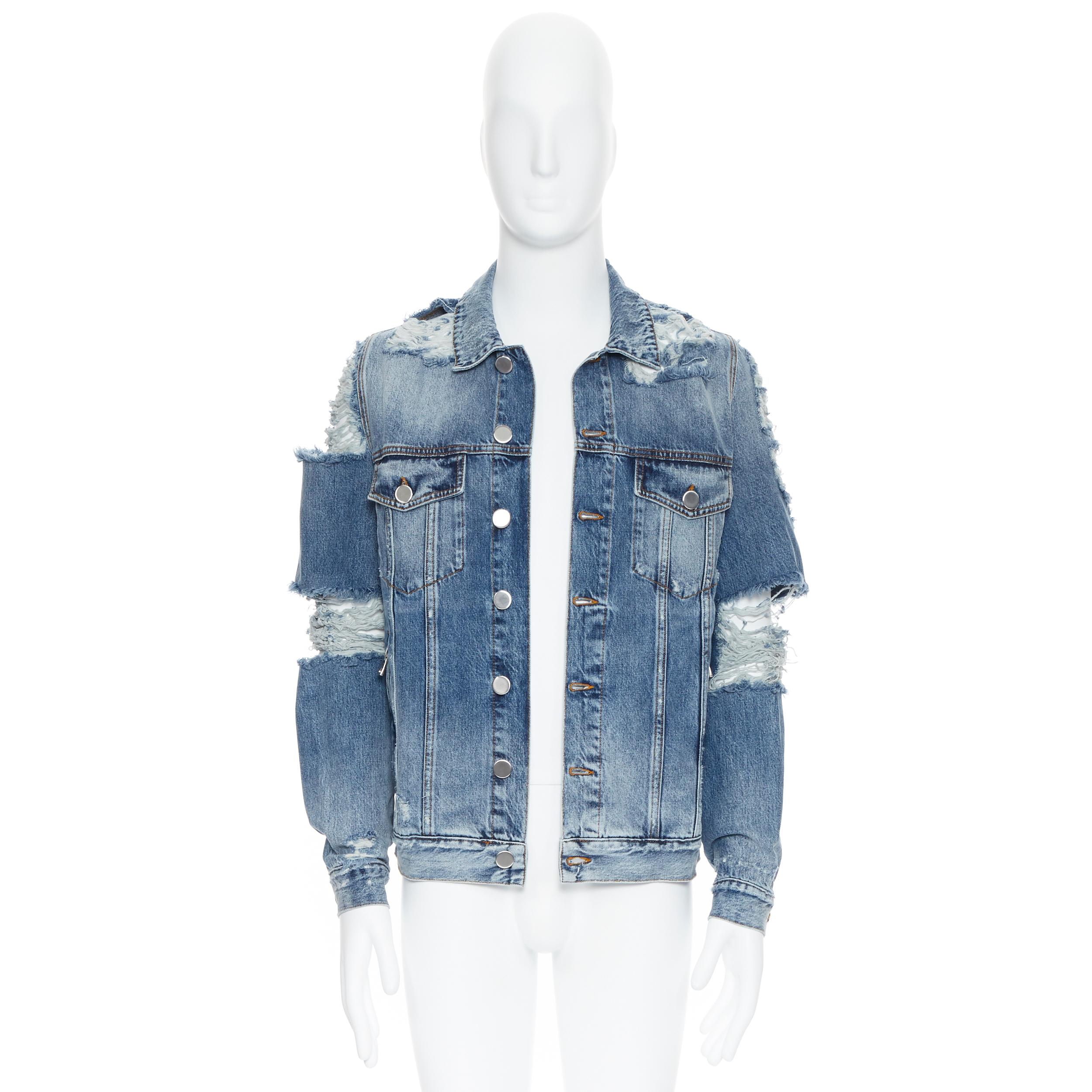 new BALMAIN blue washed heavy distressed holey casual denim trucker jacket S 
Reference: TGAS/A05491 
Brand: Balmain 
Designer: Olivier Rousteing 
Material: Cotton 
Color: Blue 
Pattern: Solid 
Closure: Button 
Extra Detail: BALMAIN style code:
