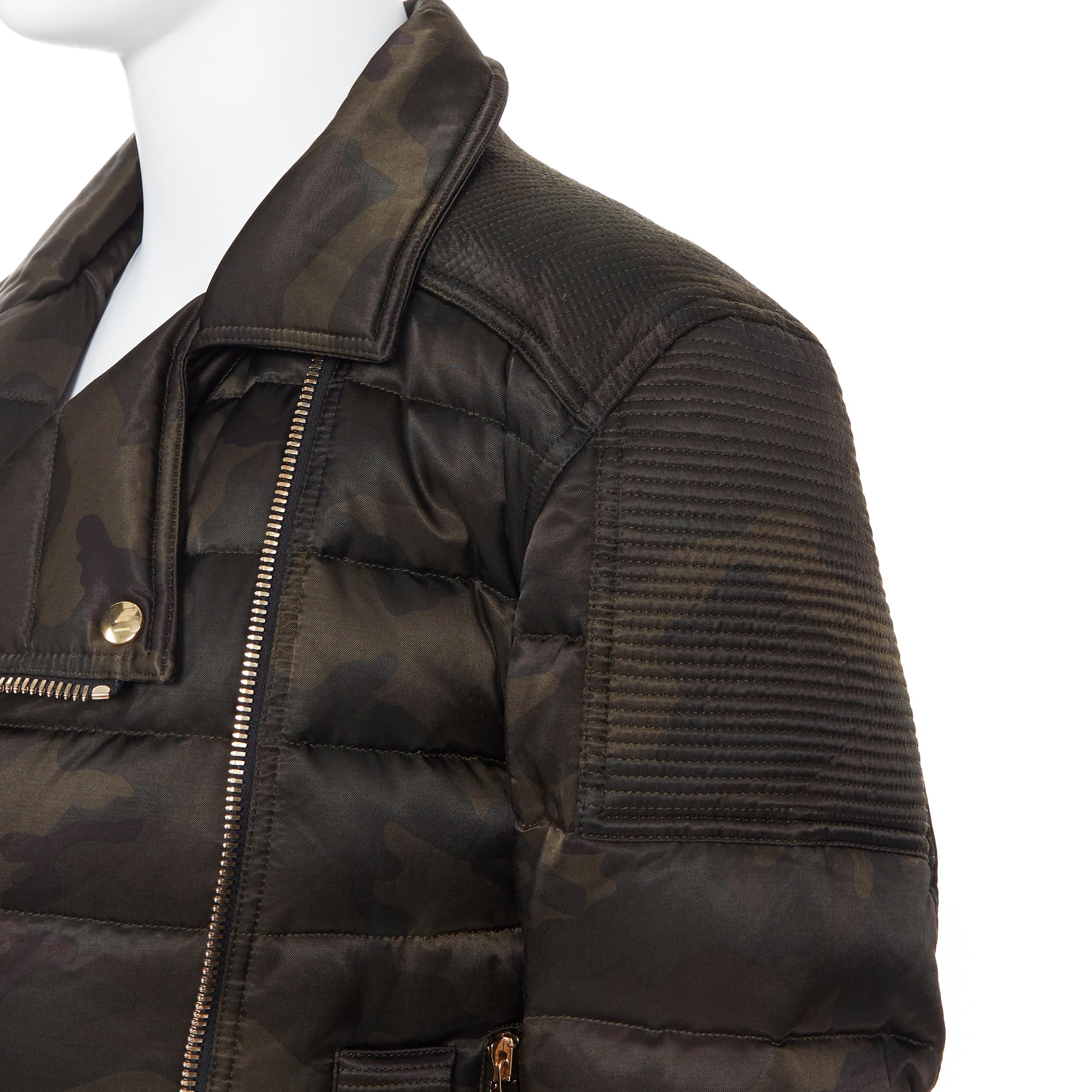 new BALMAIN green camouflage gold-tone double zip down puffer biker jacket L 
Reference: TGAS/A05459 
Brand: Balmain 
Designer: Olivier Rousteing 
Material: Cotton 
Color: Green 
Pattern: Camouflage 
Closure: Zip 
Extra Detail: BALMAIN style code: