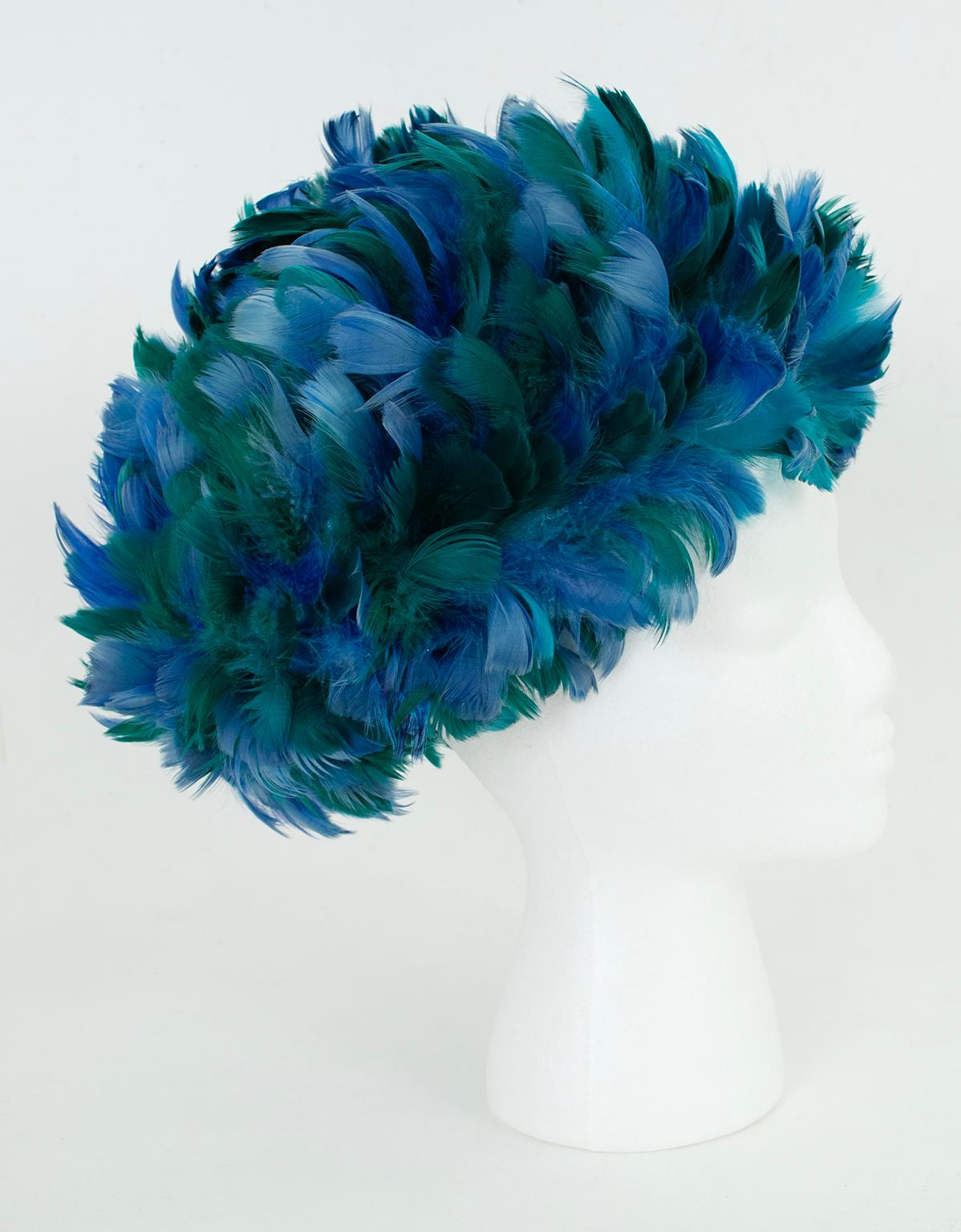 When flamboyance is required, look no further than an Afro turban of emerald and cobalt feathers.  Constructed like an elastic shower cap, when stuffed it can reach a height of nearly a foot.  A Vegas showgirl-worthy headpiece.

Elastic