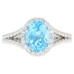 Blue Topaz and Diamond Halo Ring, 14 Karat White Gold Oval 2.66 Carat