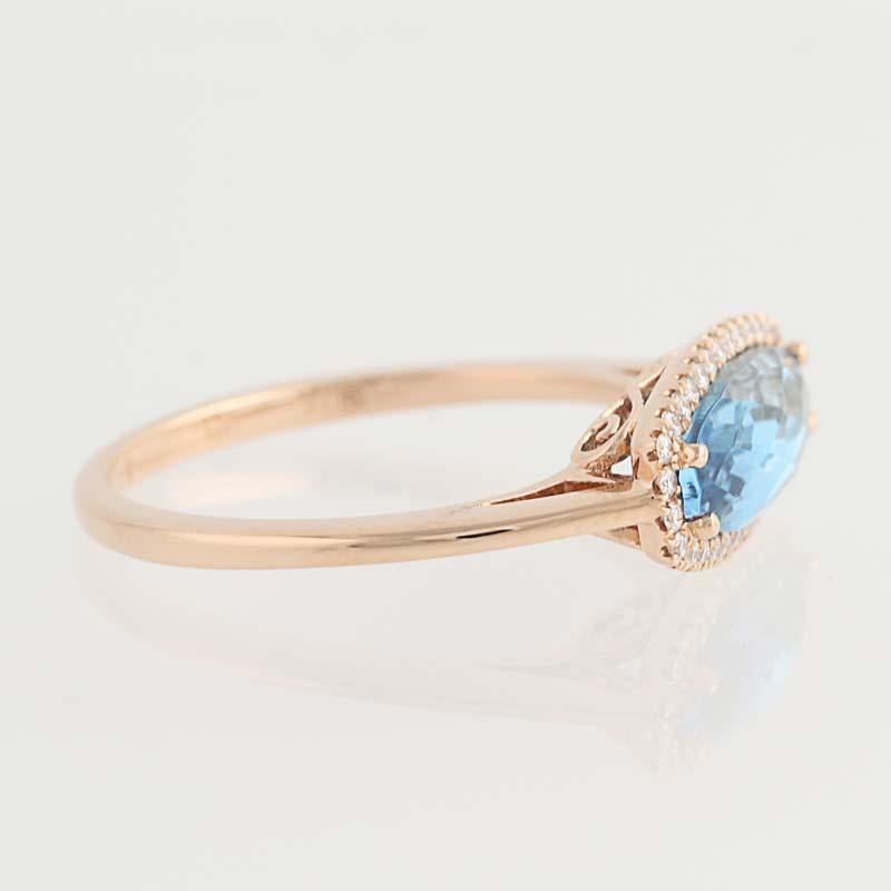 Oval Cut Blue Topaz and Diamond Ring, 14 Karat Rose Gold Halo 1.91 Carat