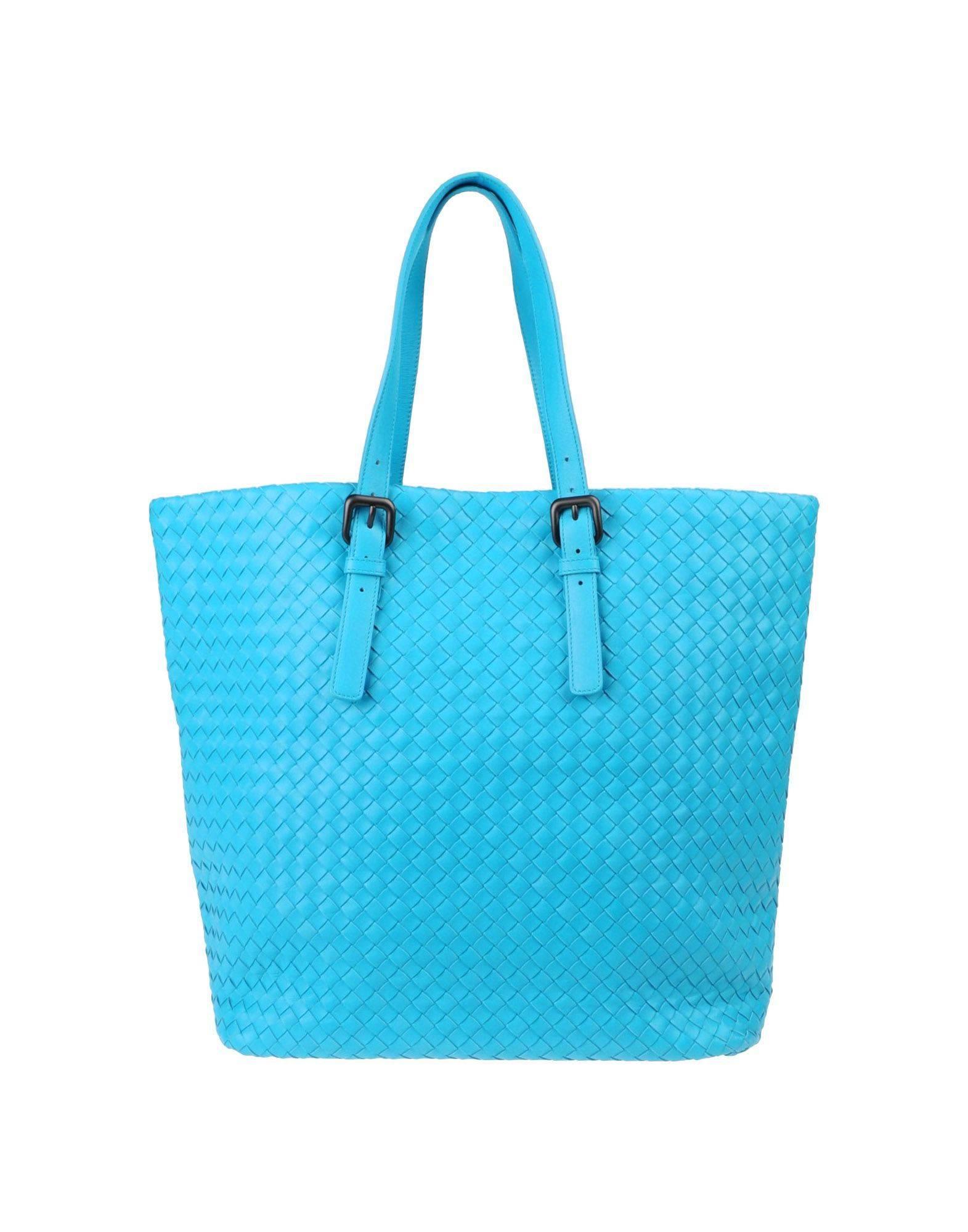 Just Gorgeous! 
NEW Bottega Veneta Intrecciato Napa Tote Handbag 
In The So Hard To Find Turquoise Aqua Color   

Details: 

A Bottega Veneta signature piece that will last you for many years
Beautiful turquoise color
Huge XL size
Can be worn over