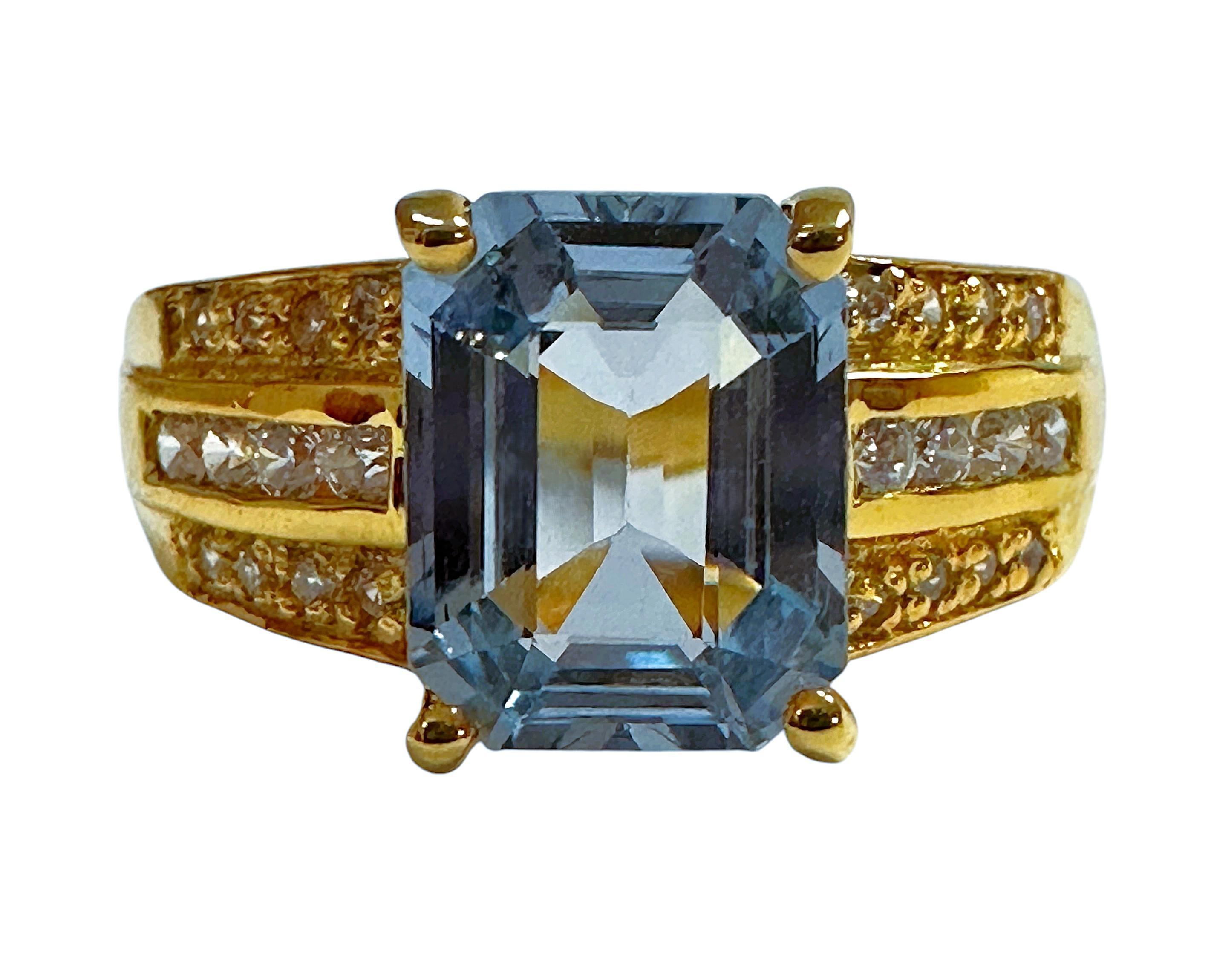 The stone is from Brazil and is just exquisite. The stone is a sea blue aquamarine and is 3.02 cts.  The stone is an emerald cut stone and measures 9 x 7.2 mm and is surrounded by diamond cut blue sapphires which really compliments the ring  It is