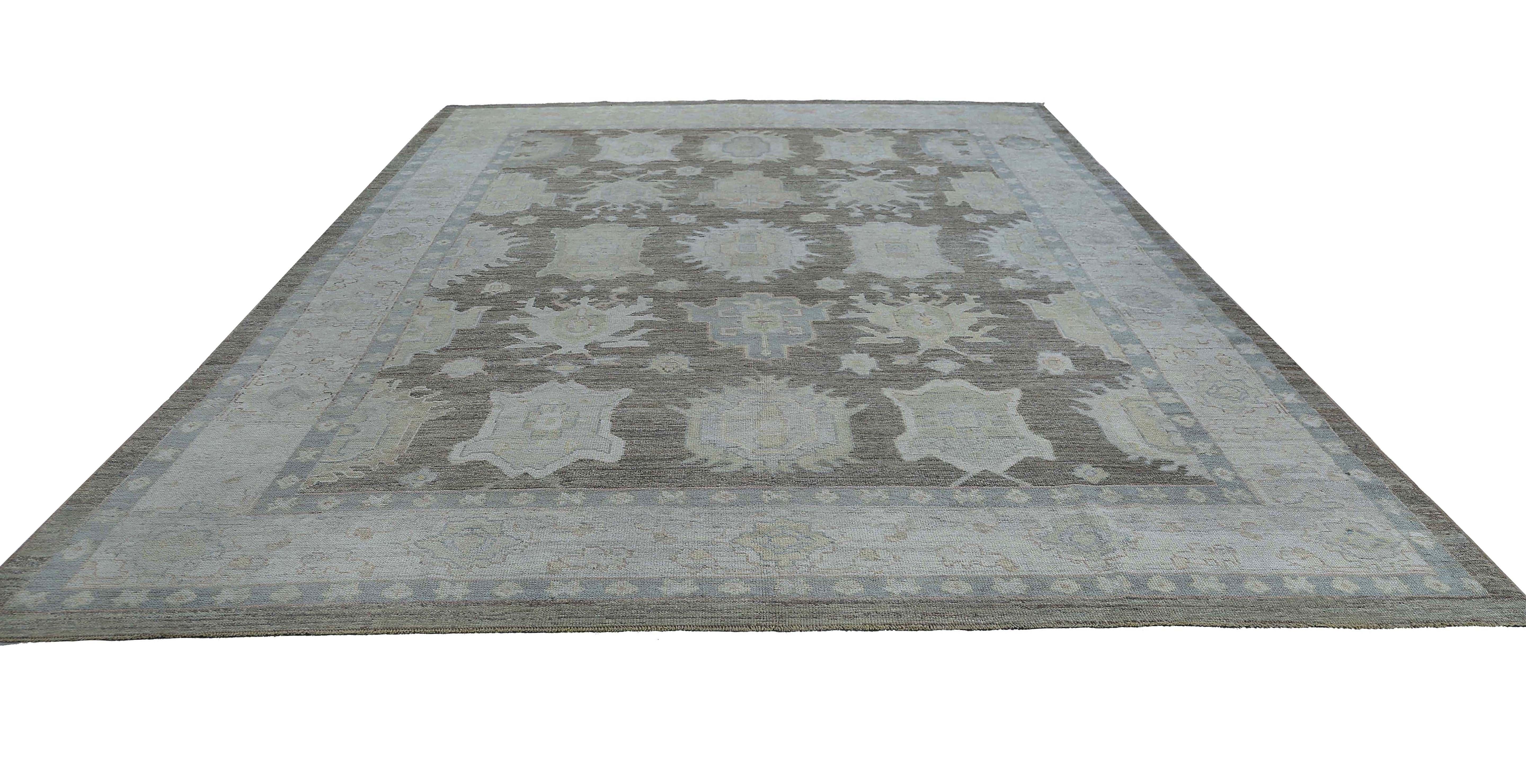 Add a touch of understated elegance to your living space with this beautiful Turkish rug. Measuring 11.2