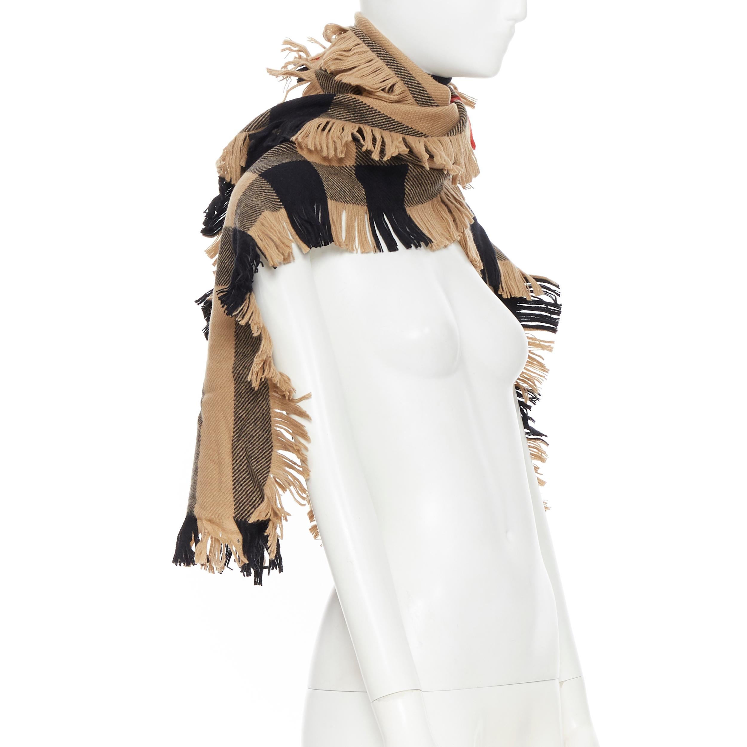 new BURBERRY 100% wooll classic brown House Check fringe trimmed scarf
Brand: Burberry
Model Name / Style: Wool scarf
Material: Wool
Color: Brown
Pattern: Check
Made in: United Kingdom

CONDITION: 
Condition: New without tags.
Comes with: Designer
