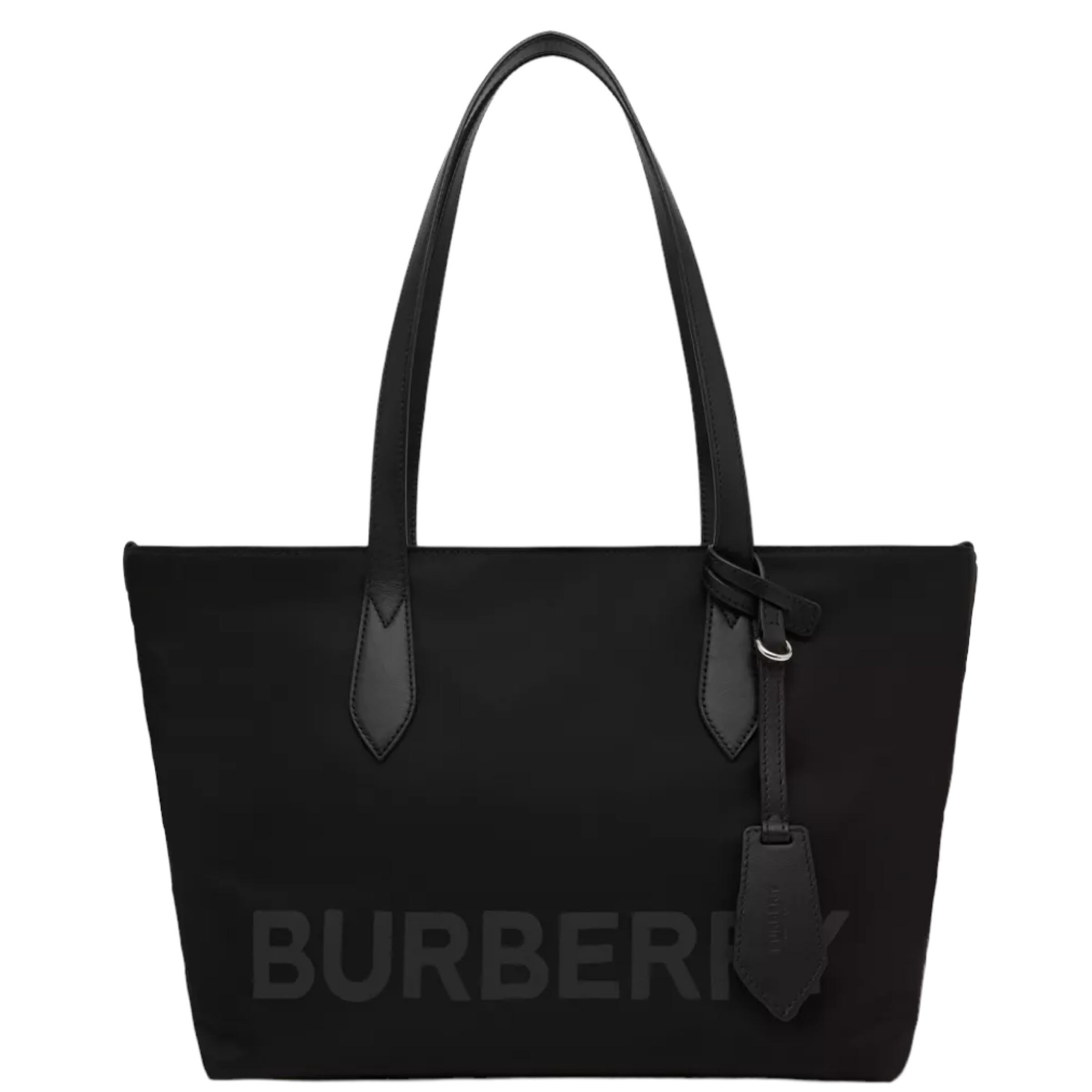New Burberry Black Printed Logo Econyl Tote Shoulder Bag

Authenticity Guaranteed

DETAILS
Brand: Burberry
Condition: Brand new
Gender: Unisex
Category: Tote bag
Color: Black
Material: Econyl
Front logo print
Silver-tone hardware
Leather handles
1
