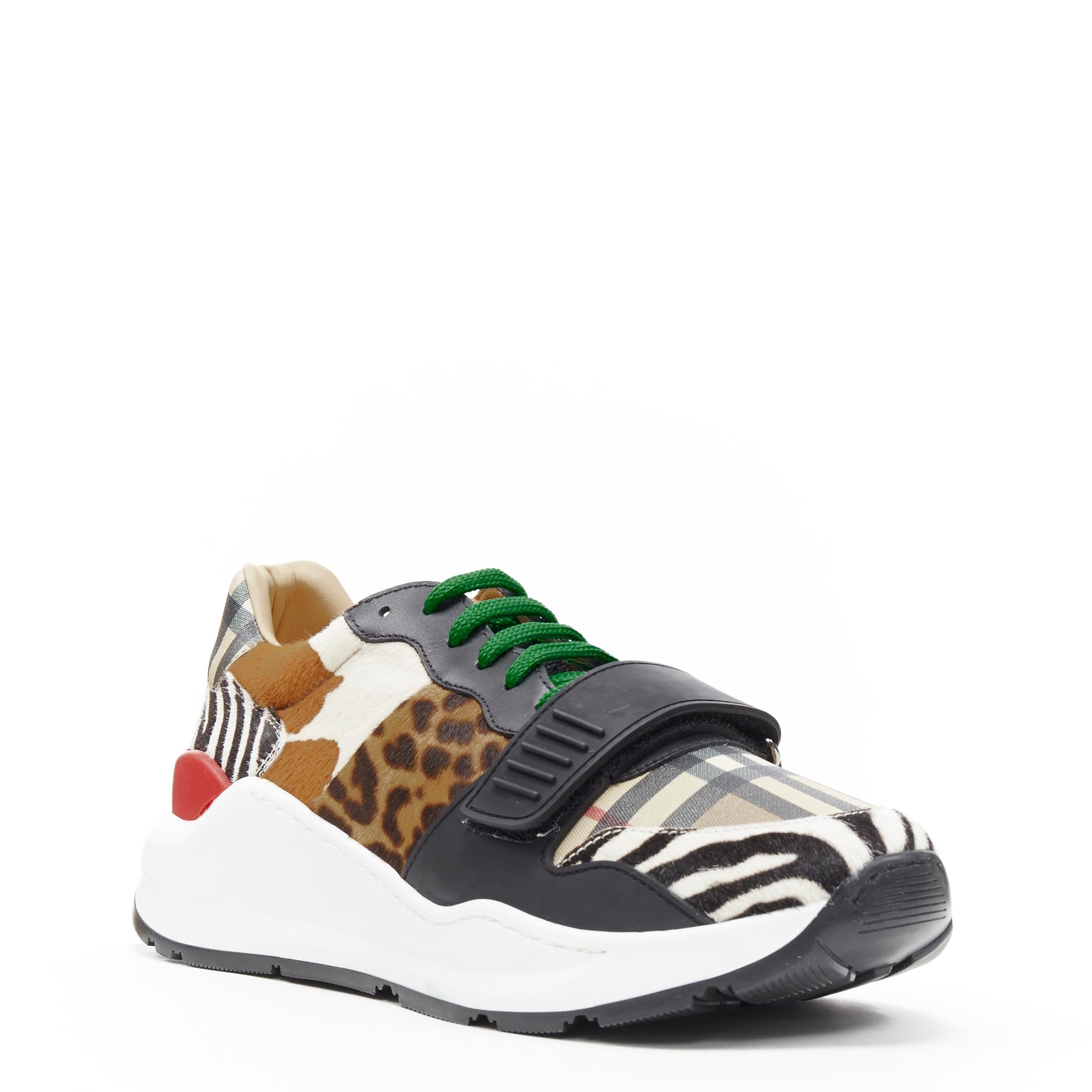 new BURBERRY TISCI Ramsey Mixed Wild Animal print low top chunky sneakers EU41
Brand: Burberry
Designer: Riccardo Tisci
Collection: 2019
Model Name / Style: Ramsey
Material: Leather
Color: Multicolour
Pattern: Animal Print
Closure: Lace up
Lining