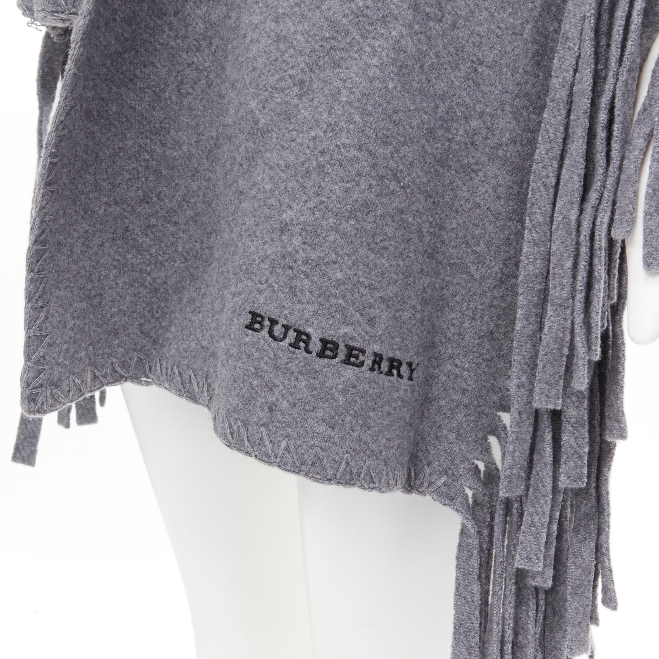 new BURBERRY wool cashmere mid grey solid felted fringe knitted overstitching detail scarf 
Reference: MELK/A00116 
Brand: Burberry 
Material: Wool 
Color: Grey 
Pattern: Solid 
Made in: Italy 

CONDITION: 
Condition: New with tags. 

MEASUREMENTS: