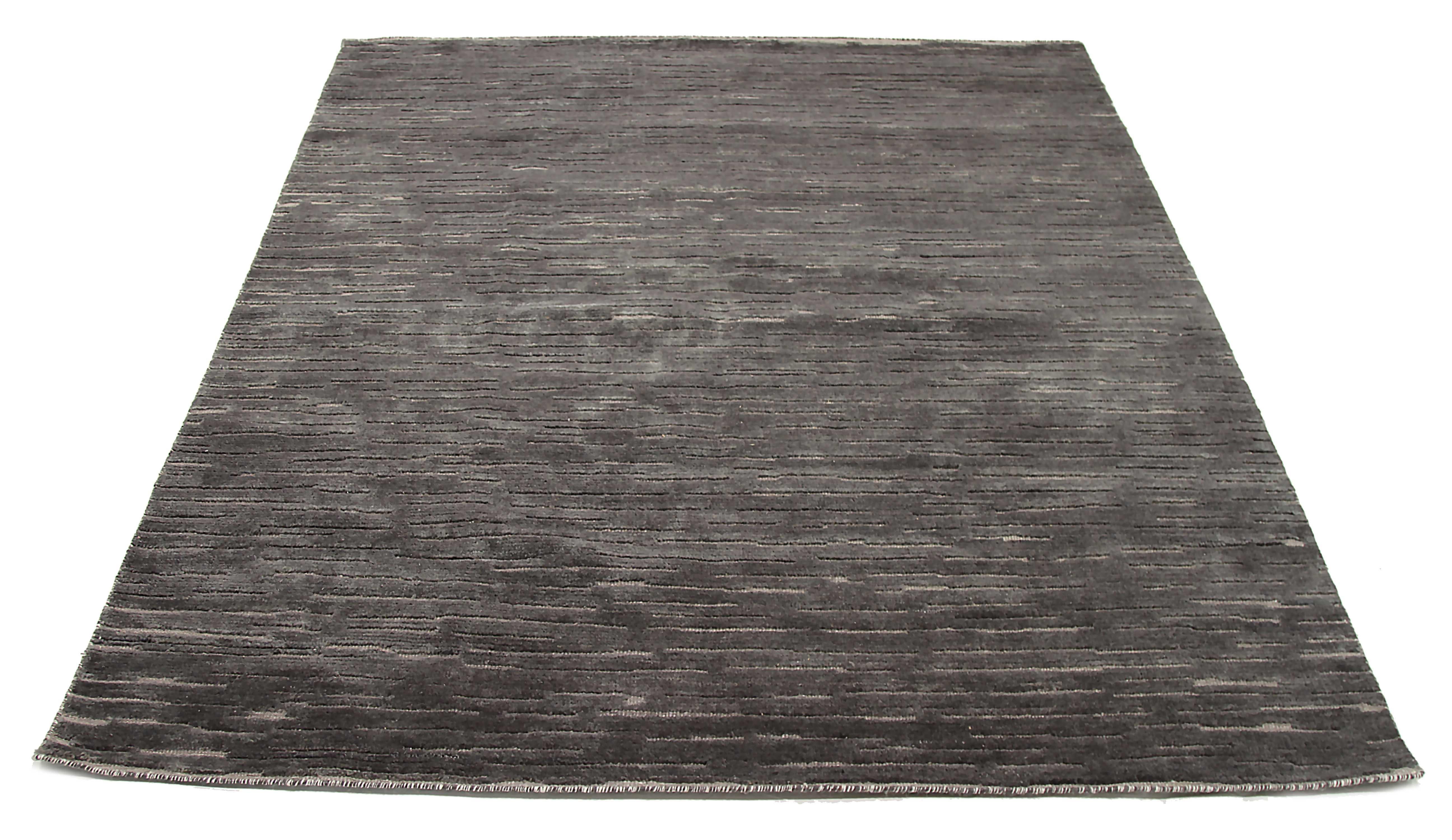 New area rug handwoven from the finest sheep’s wool. It’s colored with all-natural vegetable dyes that are safe for humans and pets. It has a nice 6’ x 8’ dimension that works perfectly in small to medium-sized rooms. 

Cameron collection is our