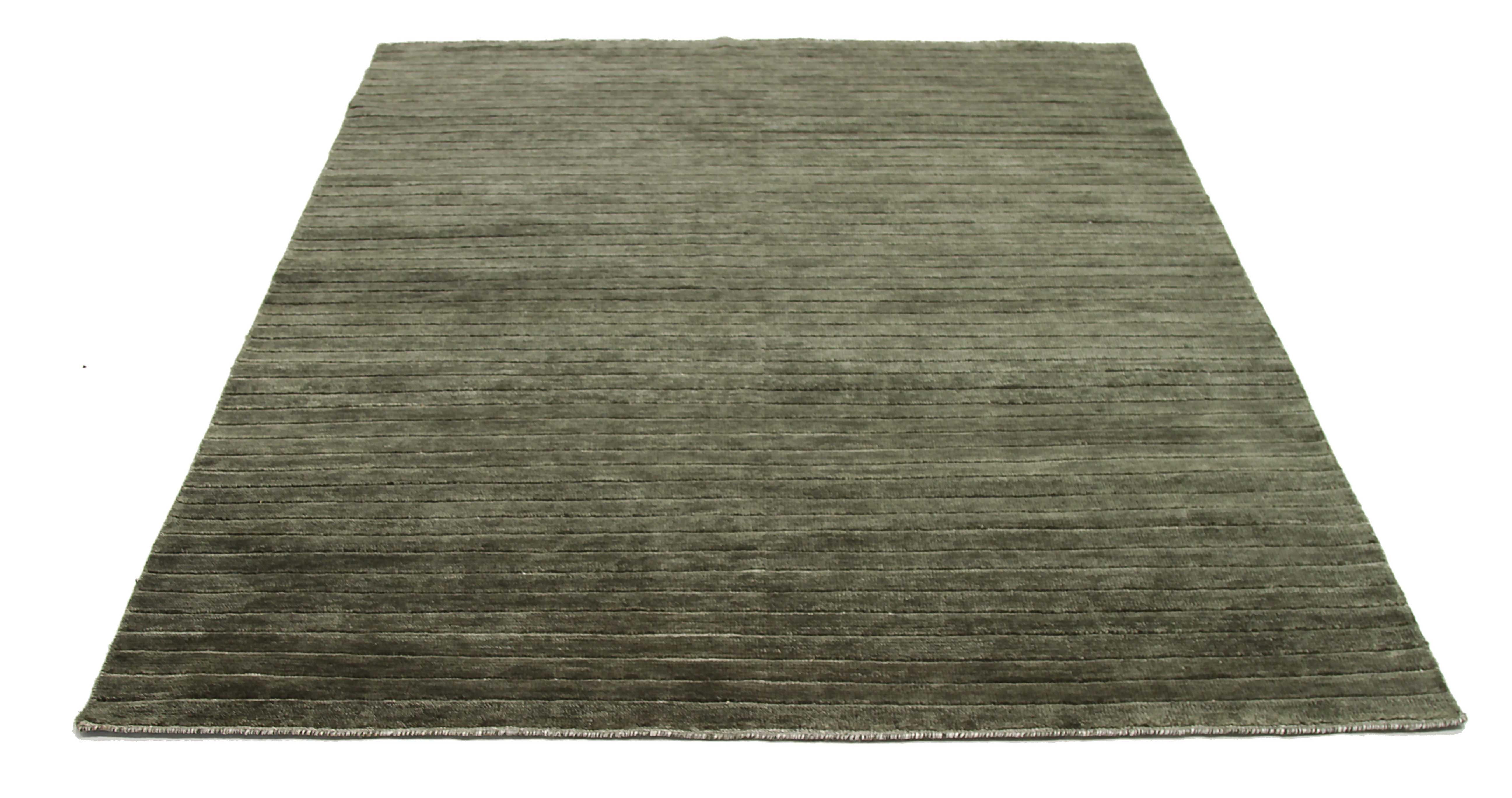 New area rug handwoven from the finest sheep’s wool. It’s colored with all-natural vegetable dyes that are safe for humans and pets. It has a nice 6’ x 8’ dimension that works perfectly in small to medium-sized rooms. 

Cameron collection is our
