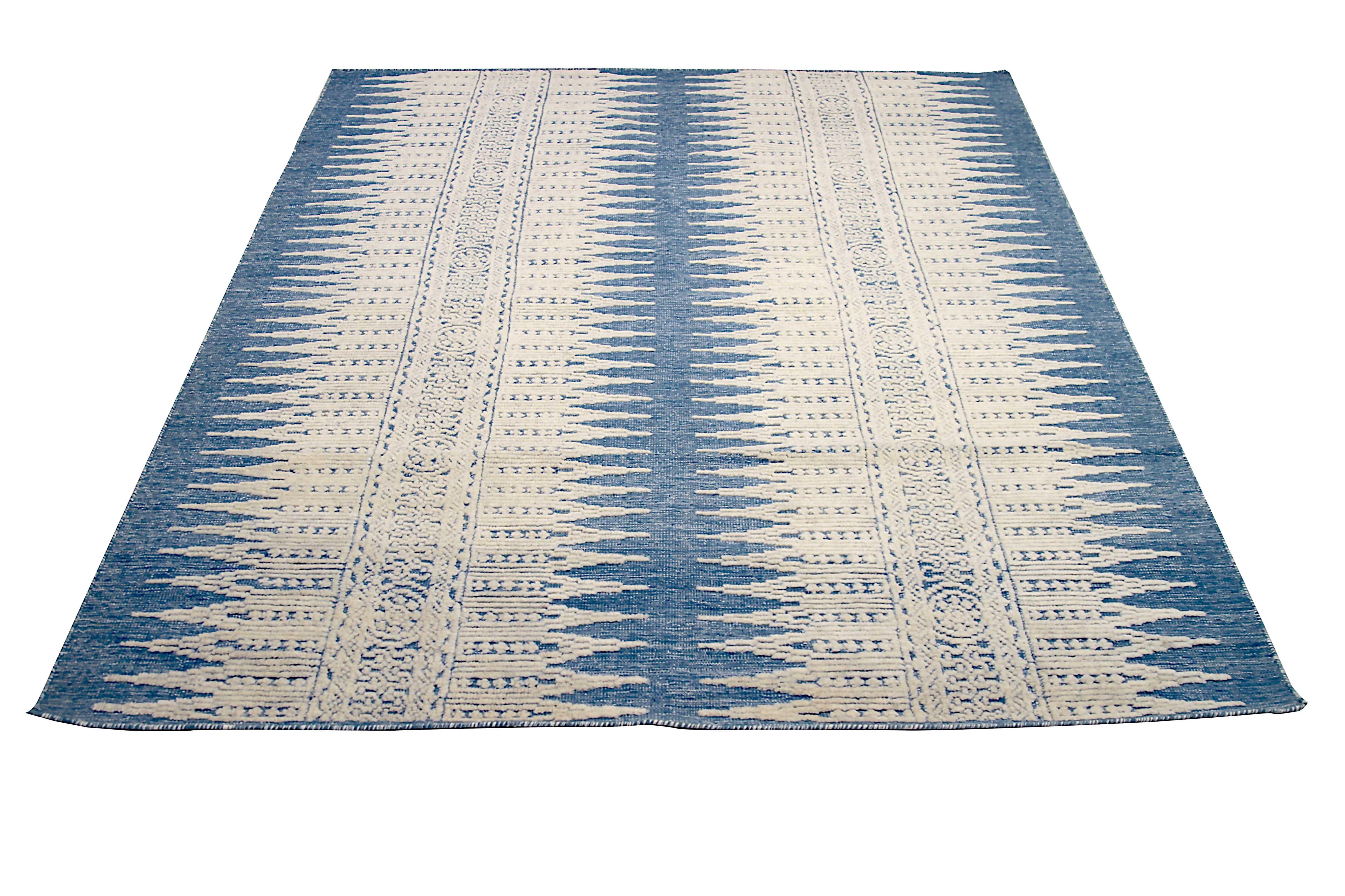 New area rug handwoven from the finest sheep’s wool. It’s colored with all-natural vegetable dyes that are safe for humans and pets. It has a nice 6’ x 8’ dimension that works perfectly in small to medium-sized rooms. 

Cameron Collection is our