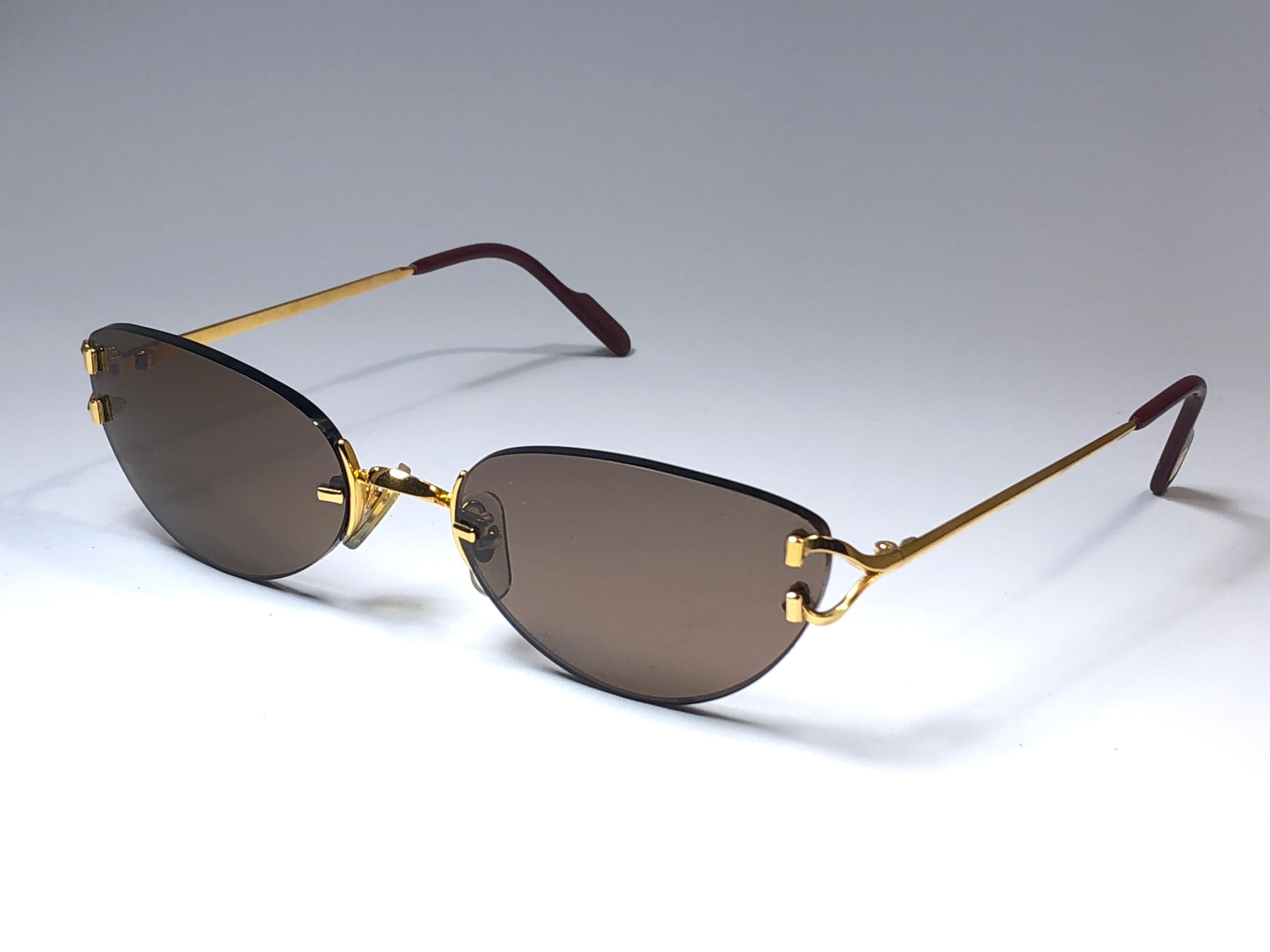 New Cartier Condotti Rimless Gold 55mm Brown Lens France Sunglasses In New Condition For Sale In Baleares, Baleares