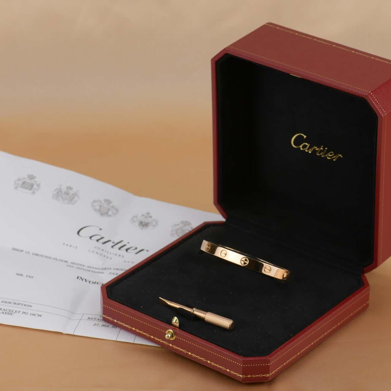 This LOVE bracelet is a classic Cartier offering. The simple bangle is made with 18K rose gold and features the iconic Cartier screw motif and features a new mechanism. The inside of the bangle is inscribed with the brand name. The bracelet has