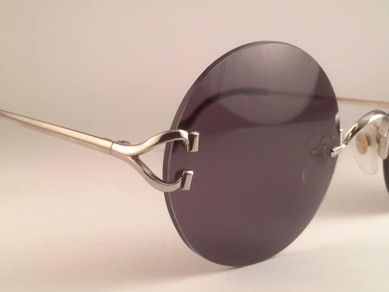 Women's or Men's New Cartier Madison Round Rimless Brushed Platine Grey Lens Sunglasses For Sale