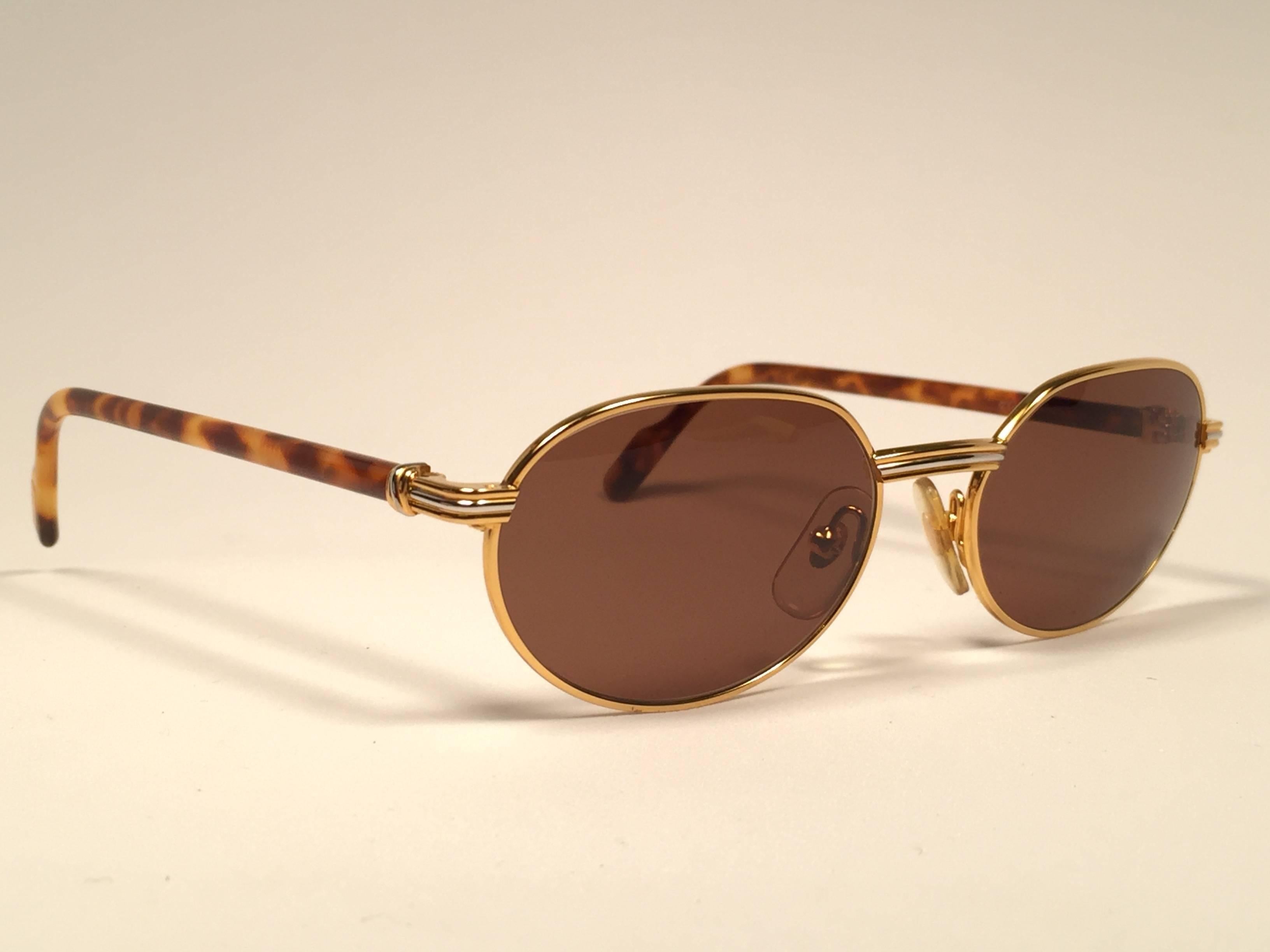 New Cartier Classic Oval Lueur 51mm Gold Plated Sunglasses Made in France In New Condition In Baleares, Baleares