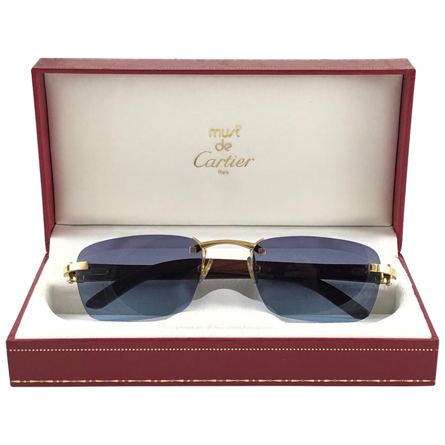 Cartier - Lunettes de soleil françaises de style classique en bois précieux, sans monture, décorée, C, neuves en vente