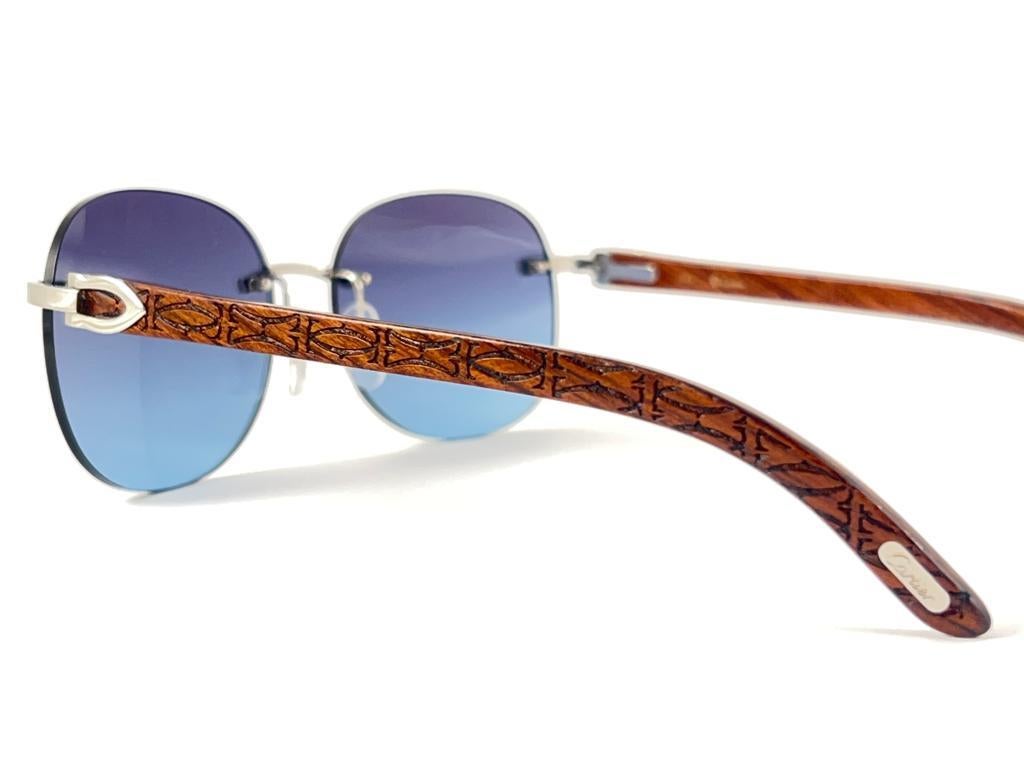 New Cartier Rimless C Decor Platine Precious Wood Full Set France Sunglasses In New Condition For Sale In Baleares, Baleares