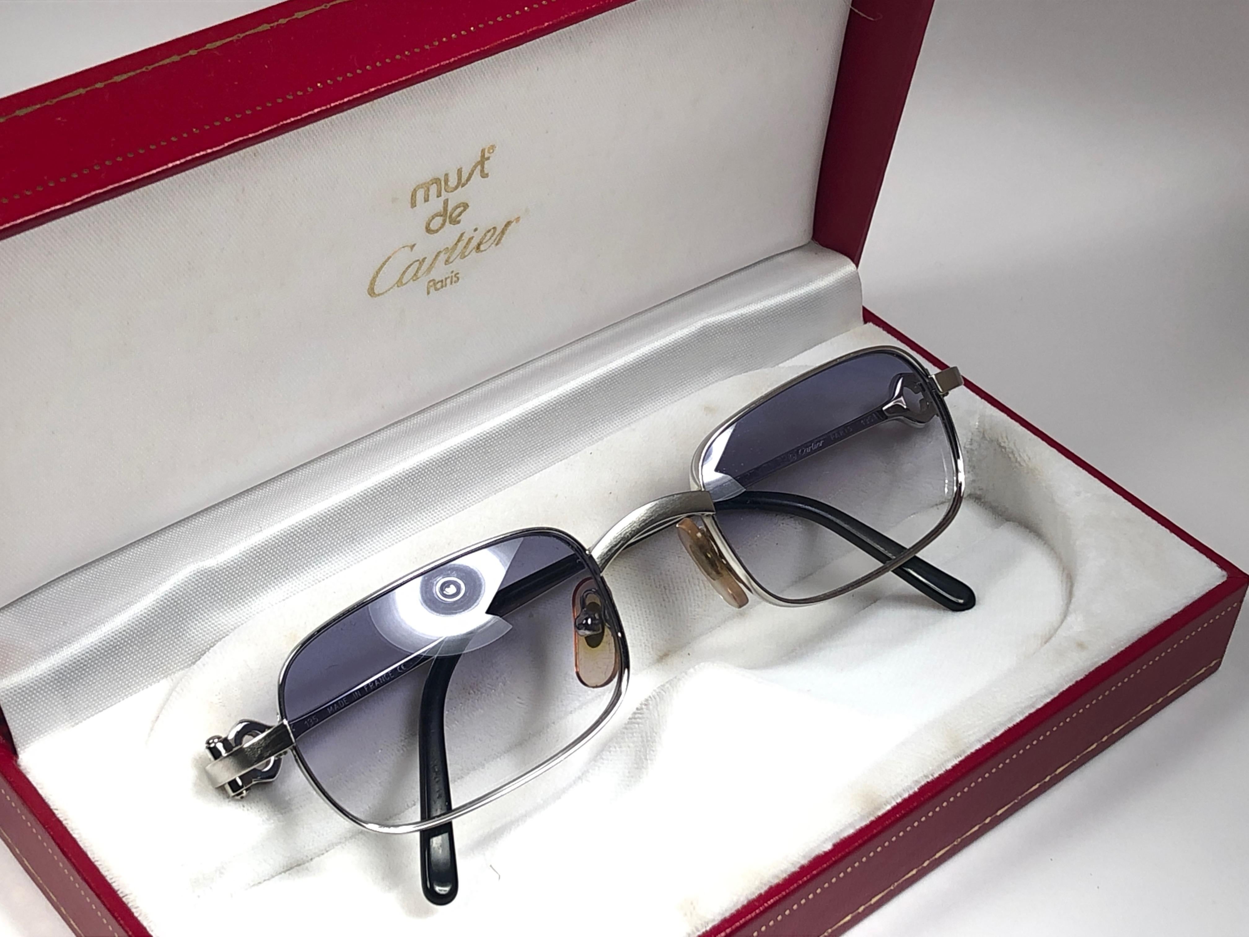 New Cartier Temper brushed platine plated with blue gradient (uv protection) lenses. 
 All hallmarks. Cartier gold signs on the earpaddles. These are like a pair of jewels on your nose with the 18k gold frame and white gold accents. Beautiful design