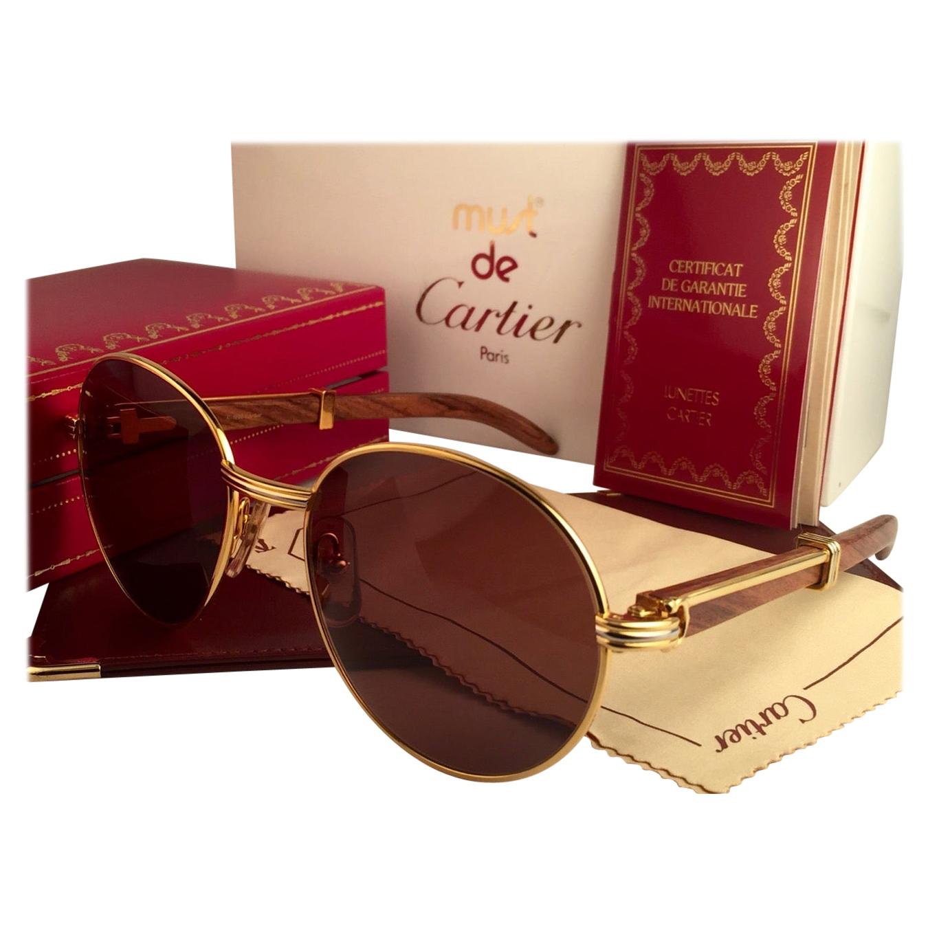 New Cartier Wood Bagatelle Round Gold and Precious Palisander 52[]18mm  Sunglasses at 1stDibs | cartier glasses wood