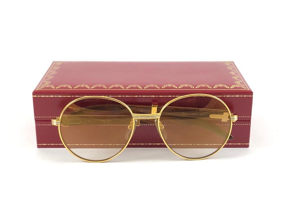 New Cartier Wood Bagatelle Round Gold & Precious Wood 55mm Brown Lens For Sale 4