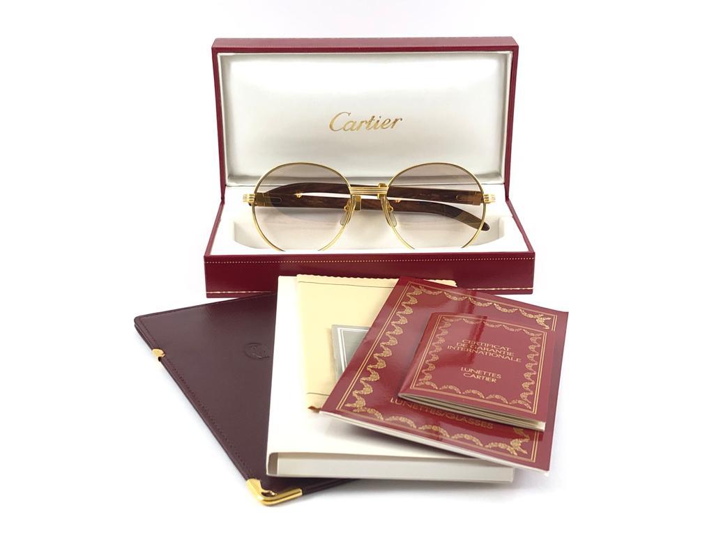 New Cartier Wood Bagatelle Round Gold & Precious Wood 55mm Brown Lens en vente 9