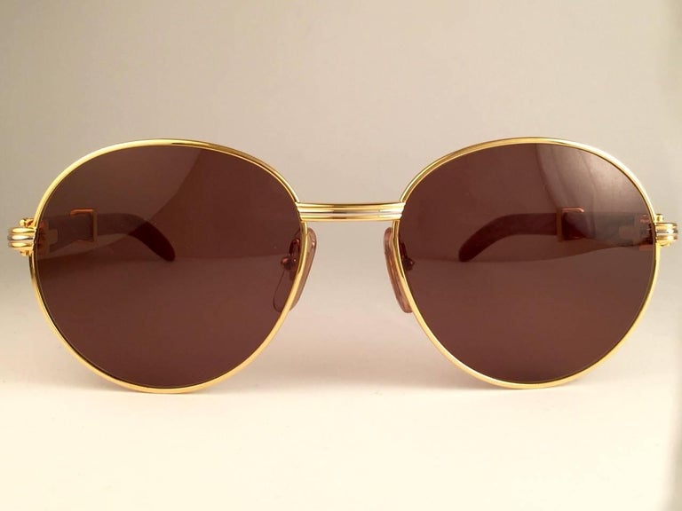 New Cartier Wood Bagatelle Round Gold and Precious Wood 55mm Brown Lens For  Sale at 1stDibs
