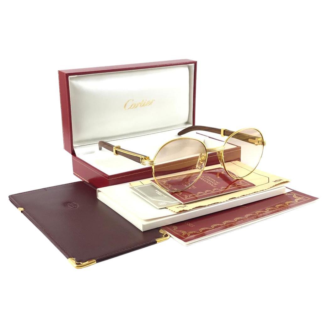 New Cartier Wood Bagatelle Round Gold & Precious Wood 55mm Brown Lens For Sale