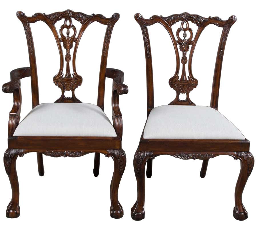 This exquisite set of 10 solid mahogany ball and claw foot dining chairs would make a perfect addition to any dining room. Traditional, functional, and well built, these chairs are of the utmost quality. The carved chair backs feature a traditional