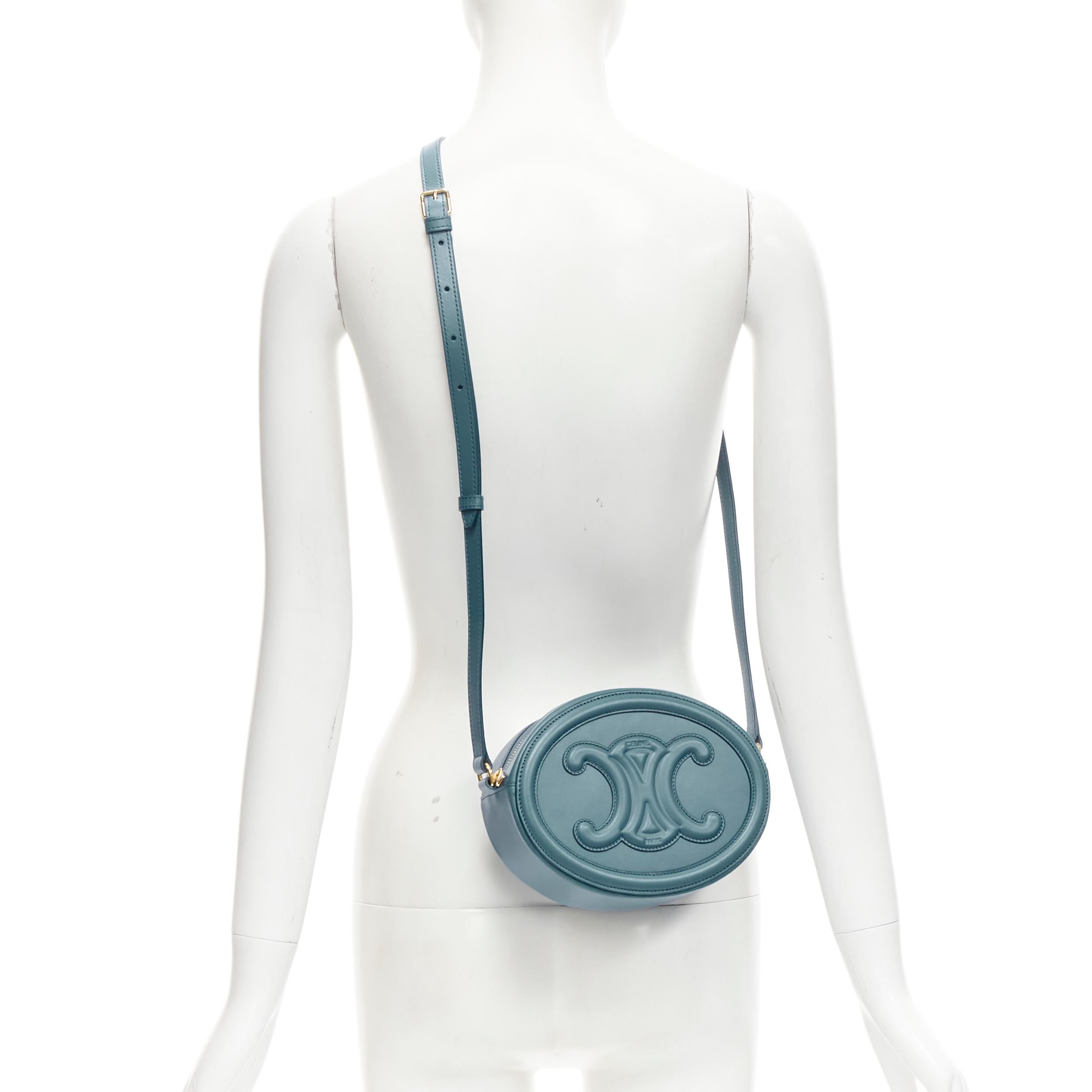 new CELINE 2023 Oval Purse blue leather Triomphe logo crossbody bag
Reference: JYLM/A00033
Brand: Celine
Model: Crossbody Oval Purse
Collection: 2023
Material: Leather
Color: Blue
Pattern: Solid
Closure: Zip
Lining: Blue Suede
Extra Details: